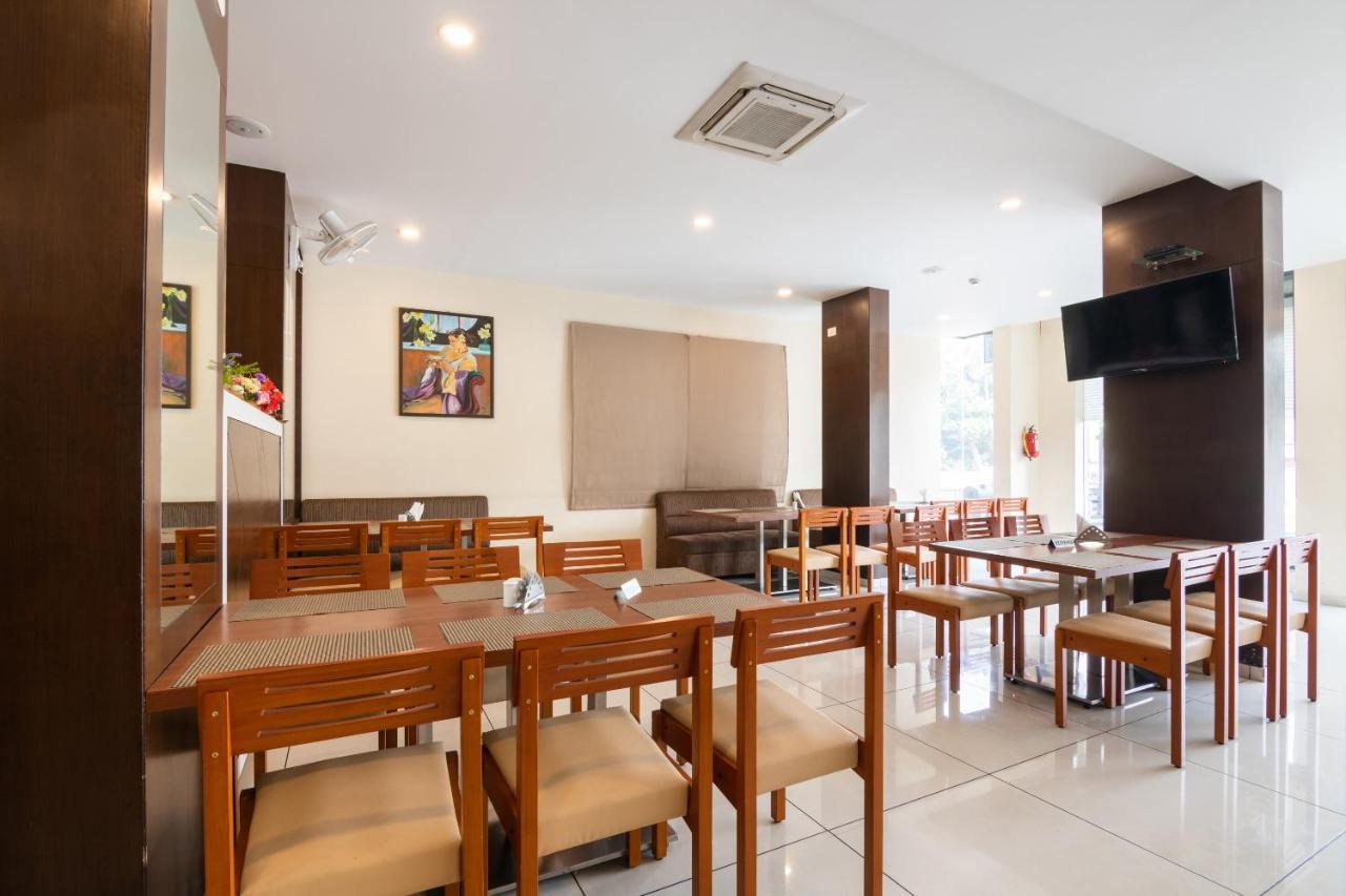 Capital O 28398 Mysore Gate Hotel Bangalore