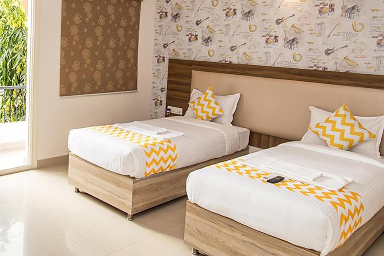 Hotel Fabexpress Hibiscus Suites Hebbal Bangalore