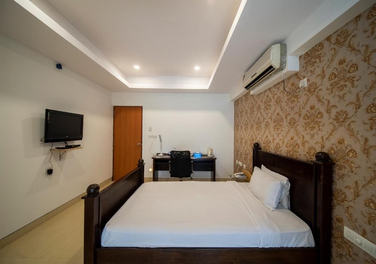 Capital O 46966 Apollo 27 Hotel Bangalore