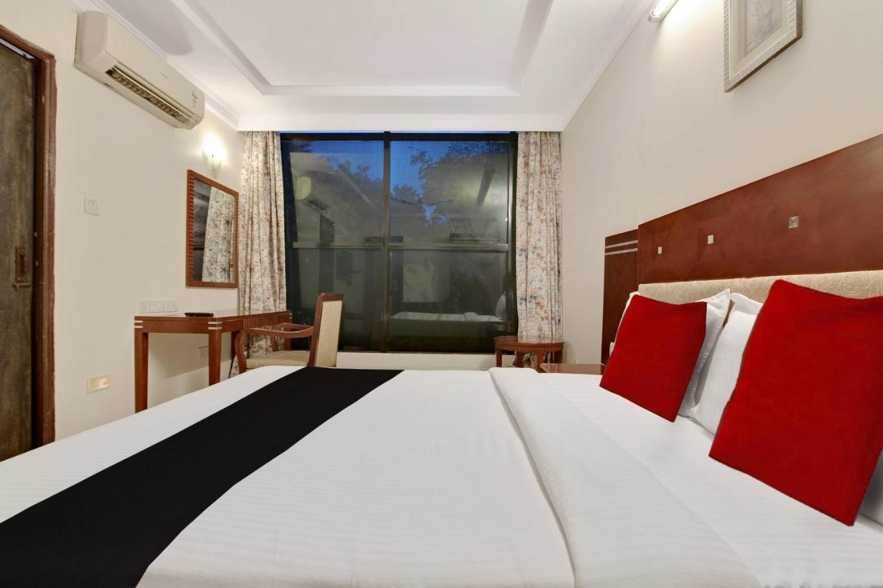 Hotel Capital O Elegant Amethyst Business Near Ragigudda Sri Prasanna Anjaneyaswamy Temple Bangalore