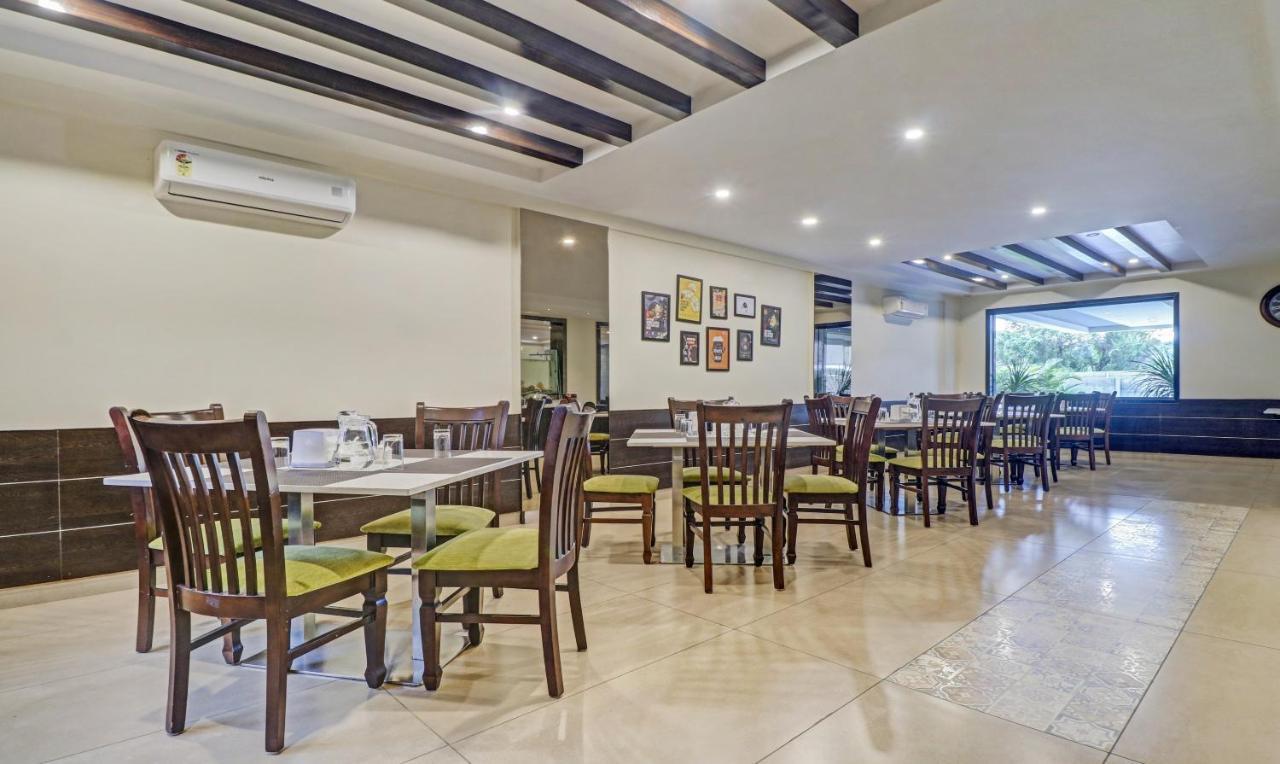 Treebo Premium Raj Vista Global Village Hotel Bangalore