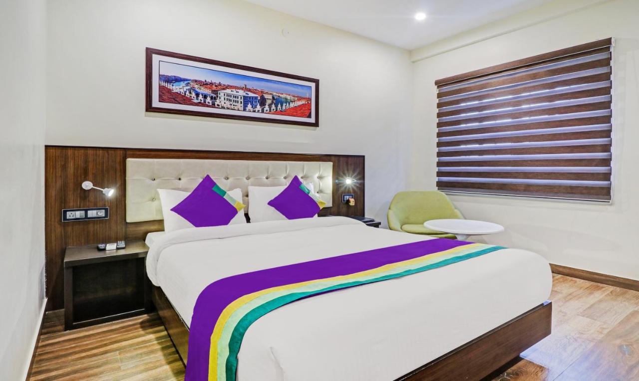 Treebo Premium Raj Vista Global Village