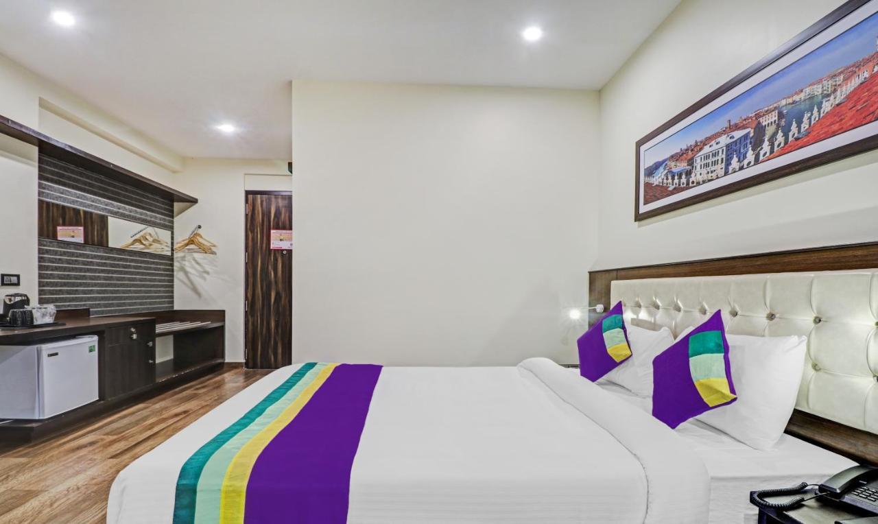 Treebo Premium Raj Vista Global Village