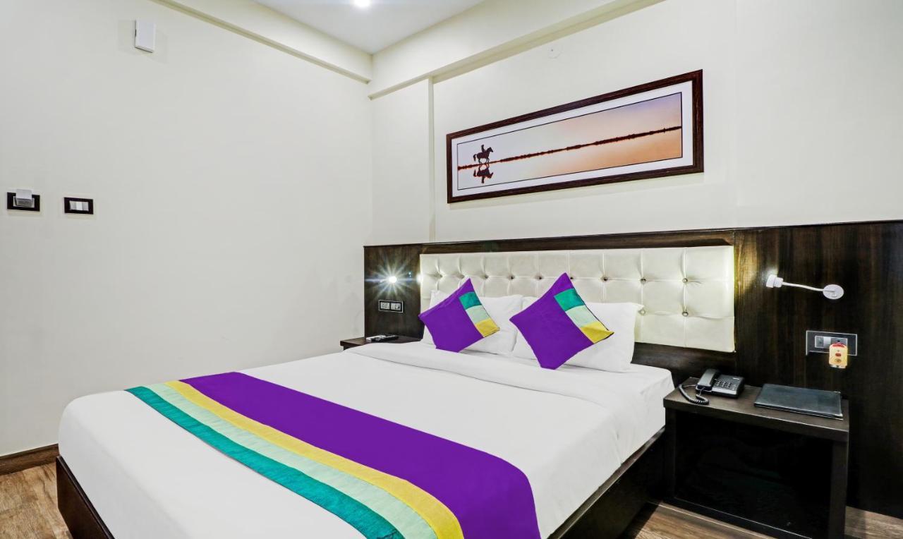 Treebo Premium Raj Vista Global Village