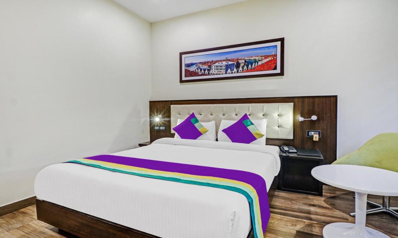 Treebo Premium Raj Vista Global Village Hotel Bangalore