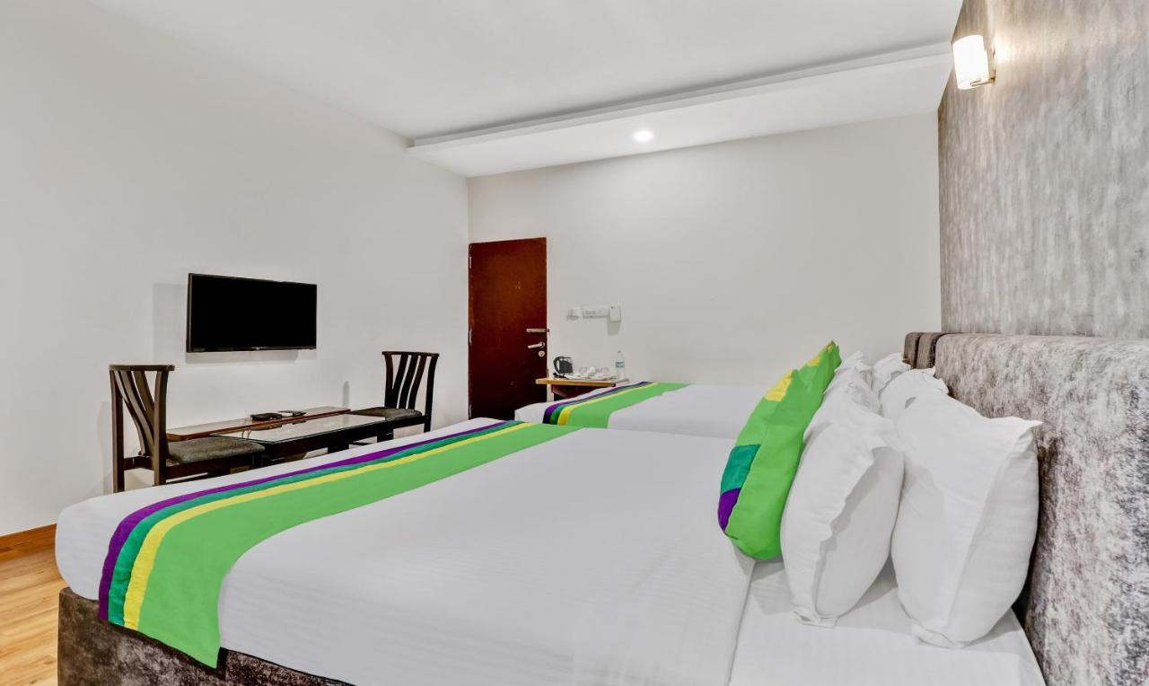 Treebo Trip Dhanvitha Suites Bannerghatta Main Road 3*