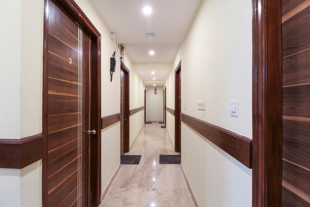Capital O 64592 Dhanvitha Residency Hotel
