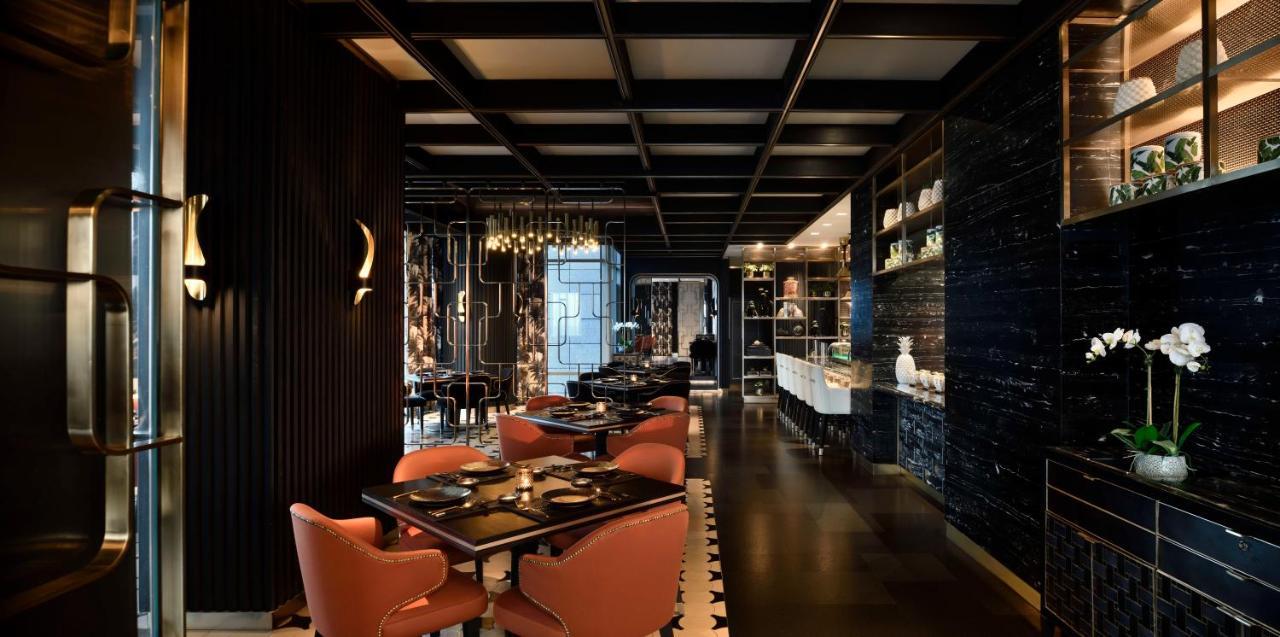 Four Seasons At Embassy One Hotel