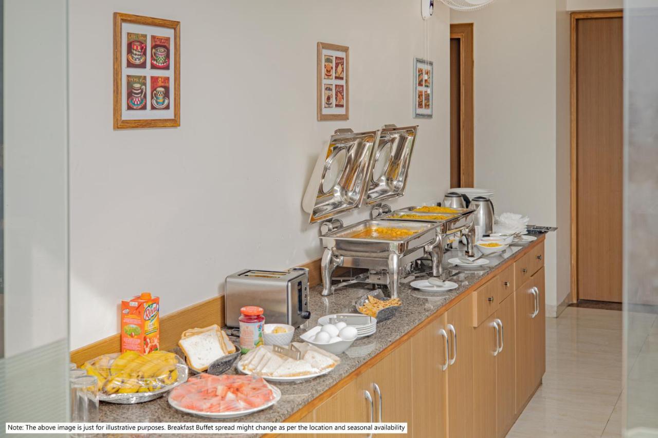 Treebo Premium Raj Vista Global Village Hotel Bangalore
