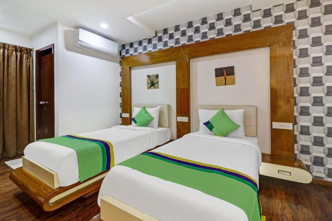 Hotel Treebo Trend The White Tree Hope Farm Junction Bangalore