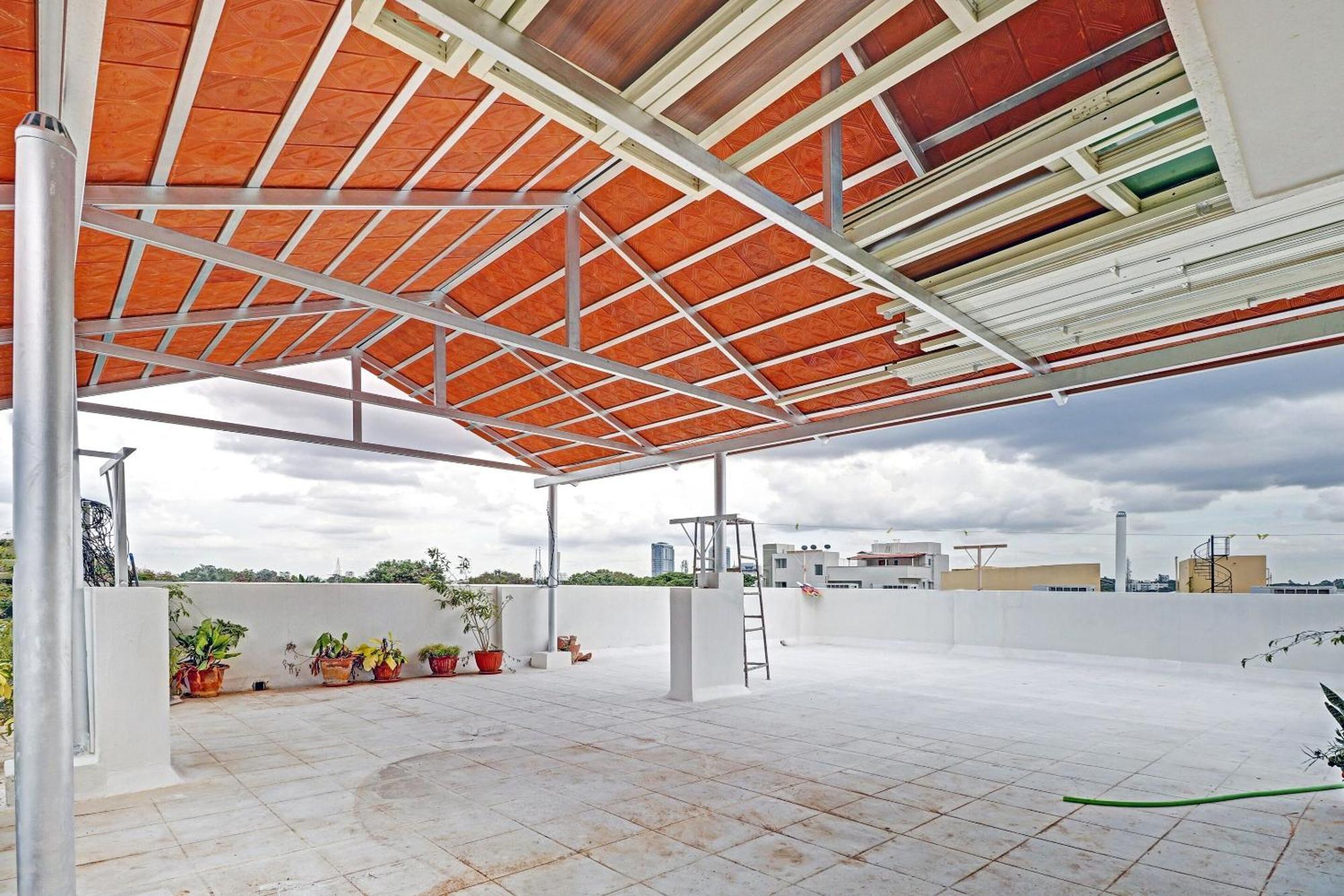 Capital O R R Residency Hotel
