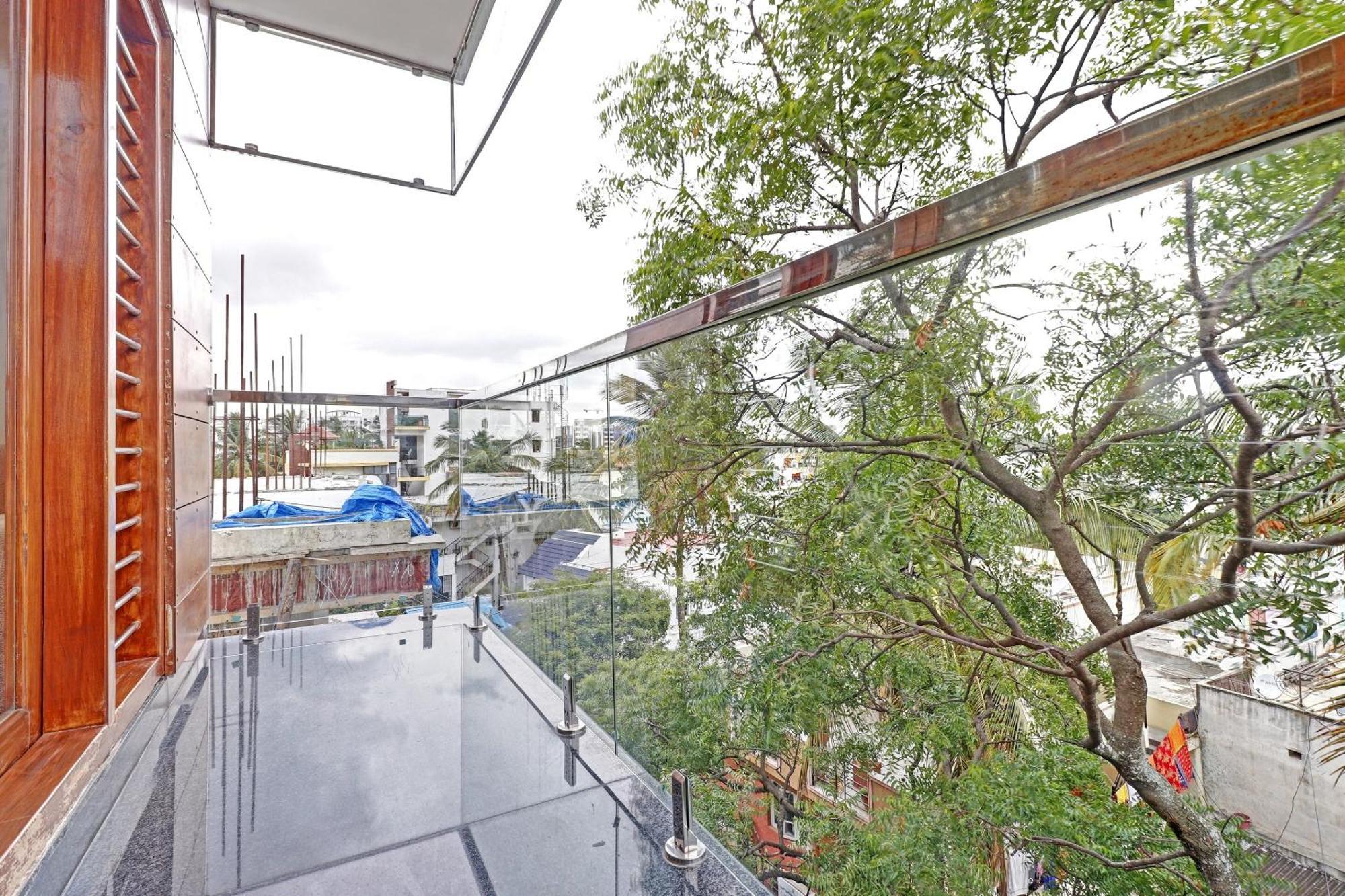Capital O R R Residency Hotel