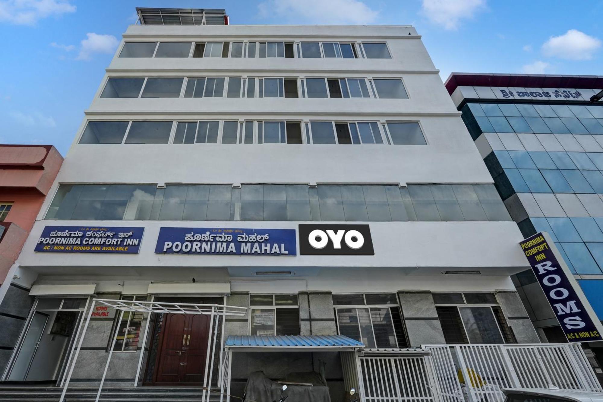 Oyo Poornima Mahal Hotel