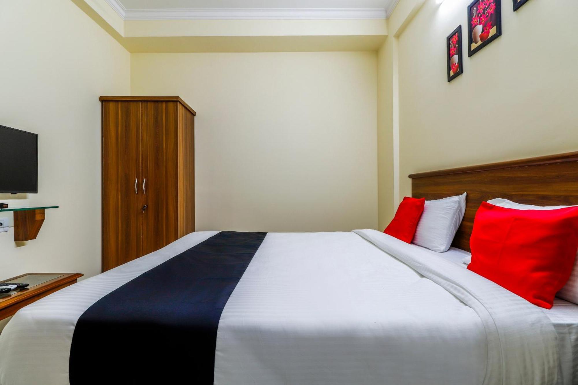 Capital O Sln Residency Hotel