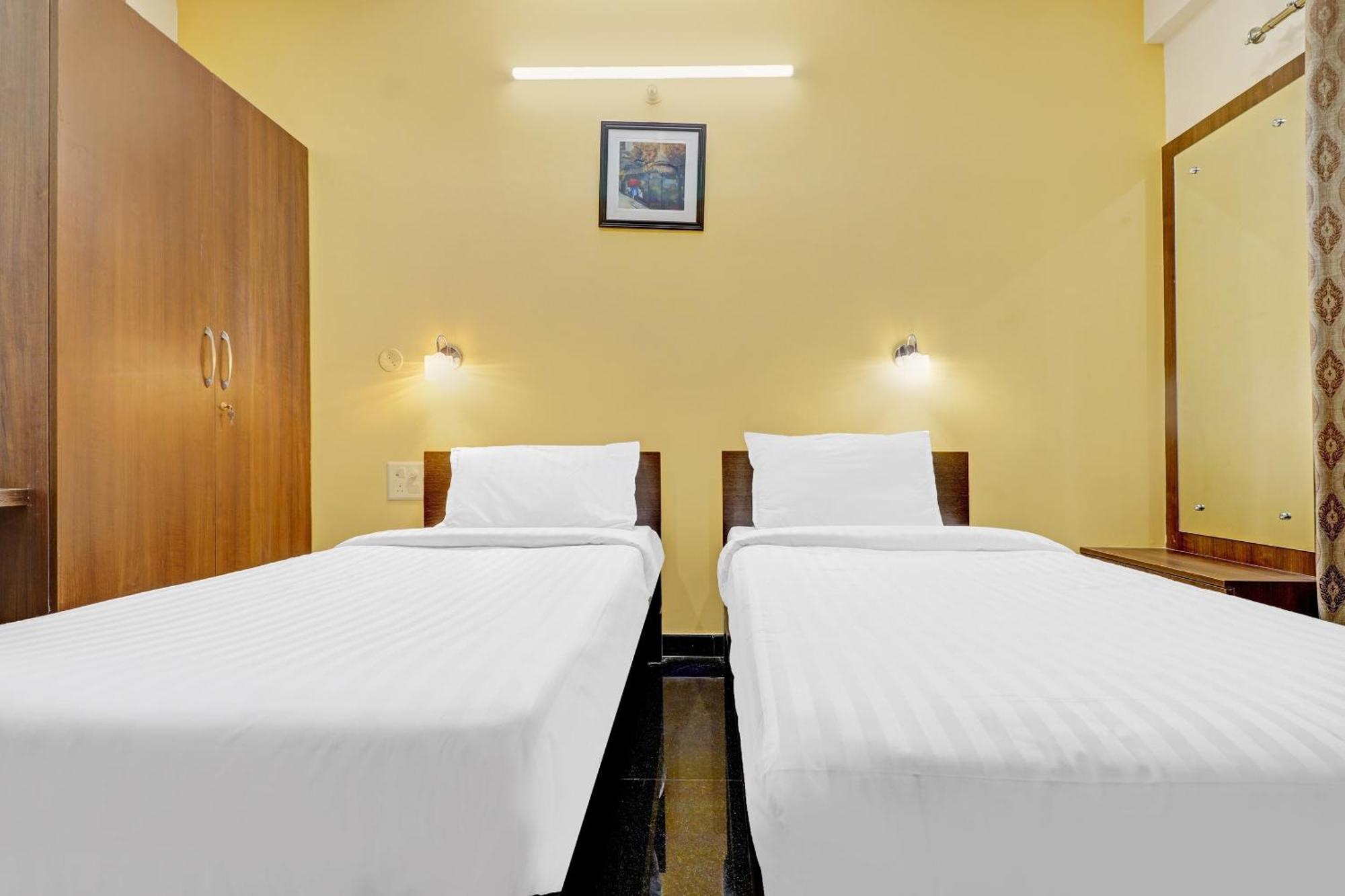Capital O R R Residency Hotel
