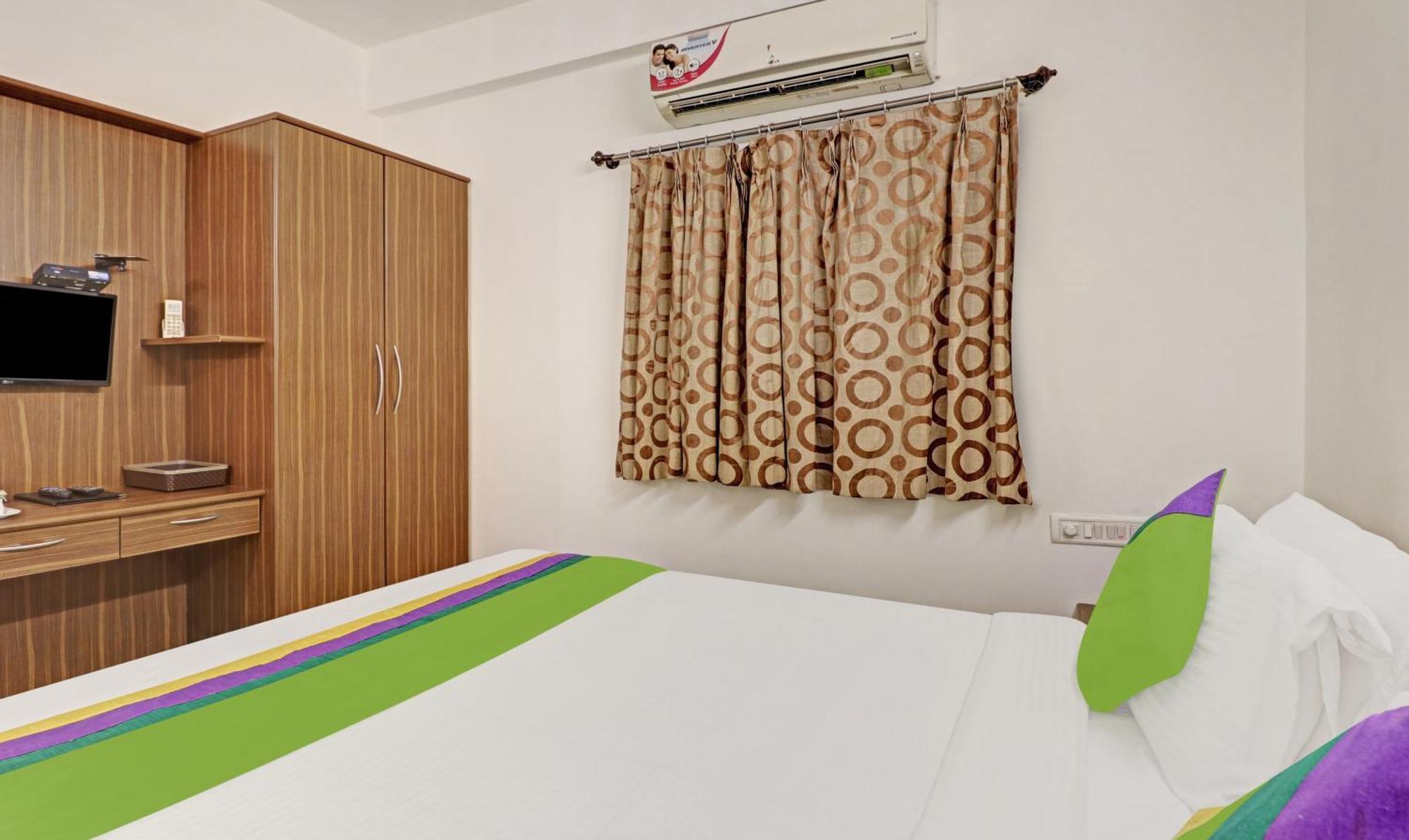 Treebo Trinitywood Hotel Bangalore
