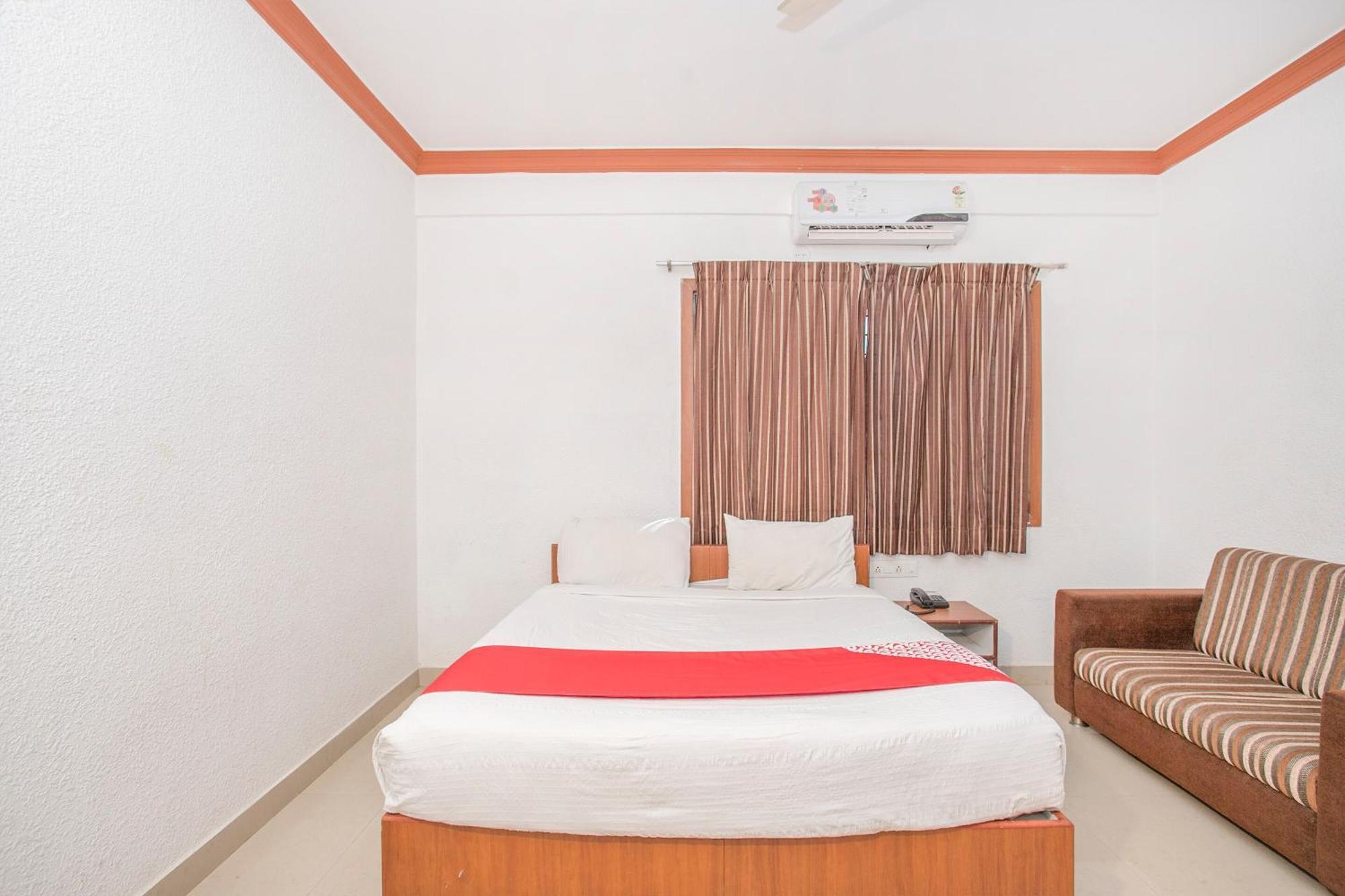 Hotel Collection O Pride Homes Bangalore