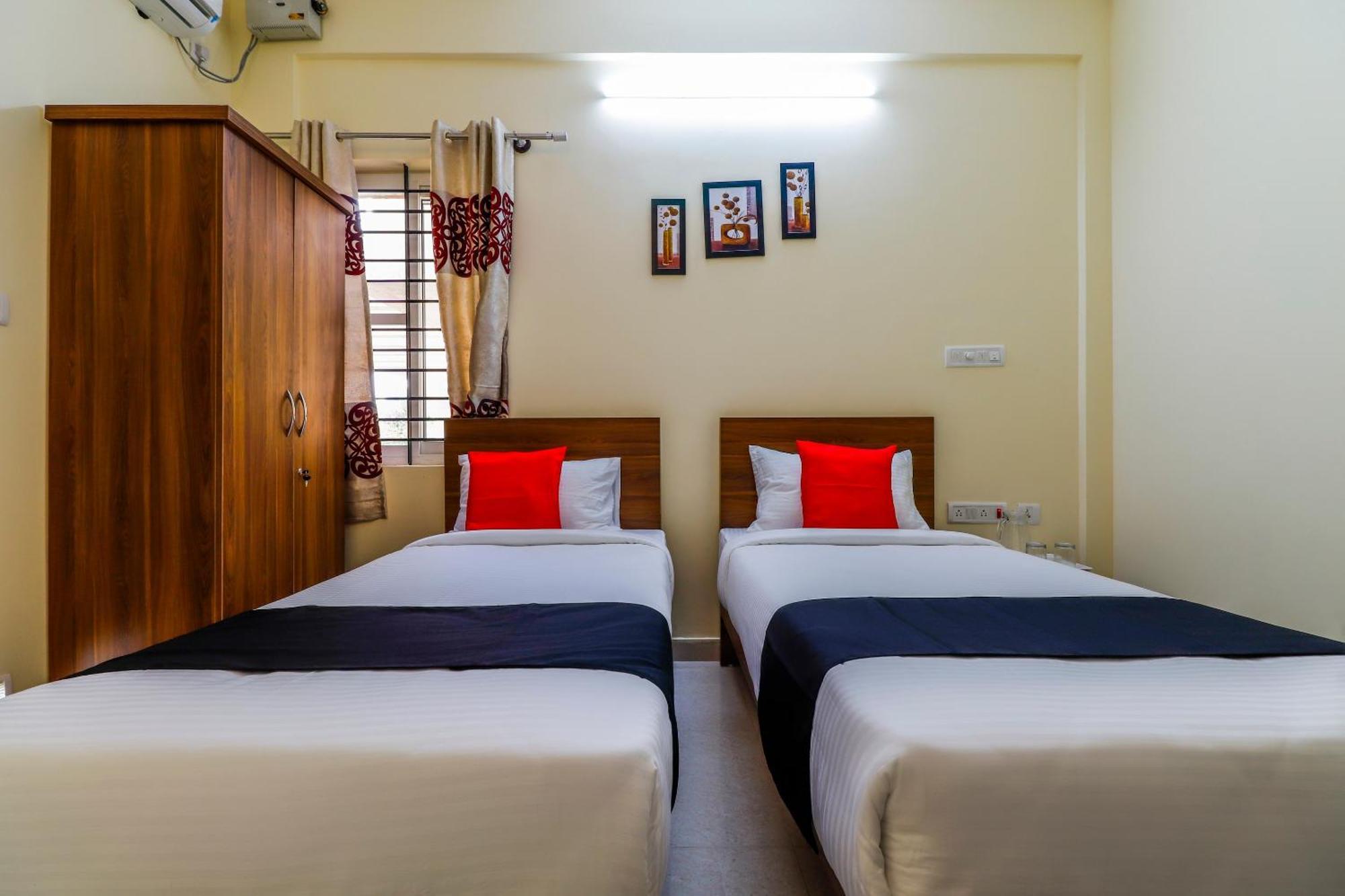 Capital O Sln Residency Hotel