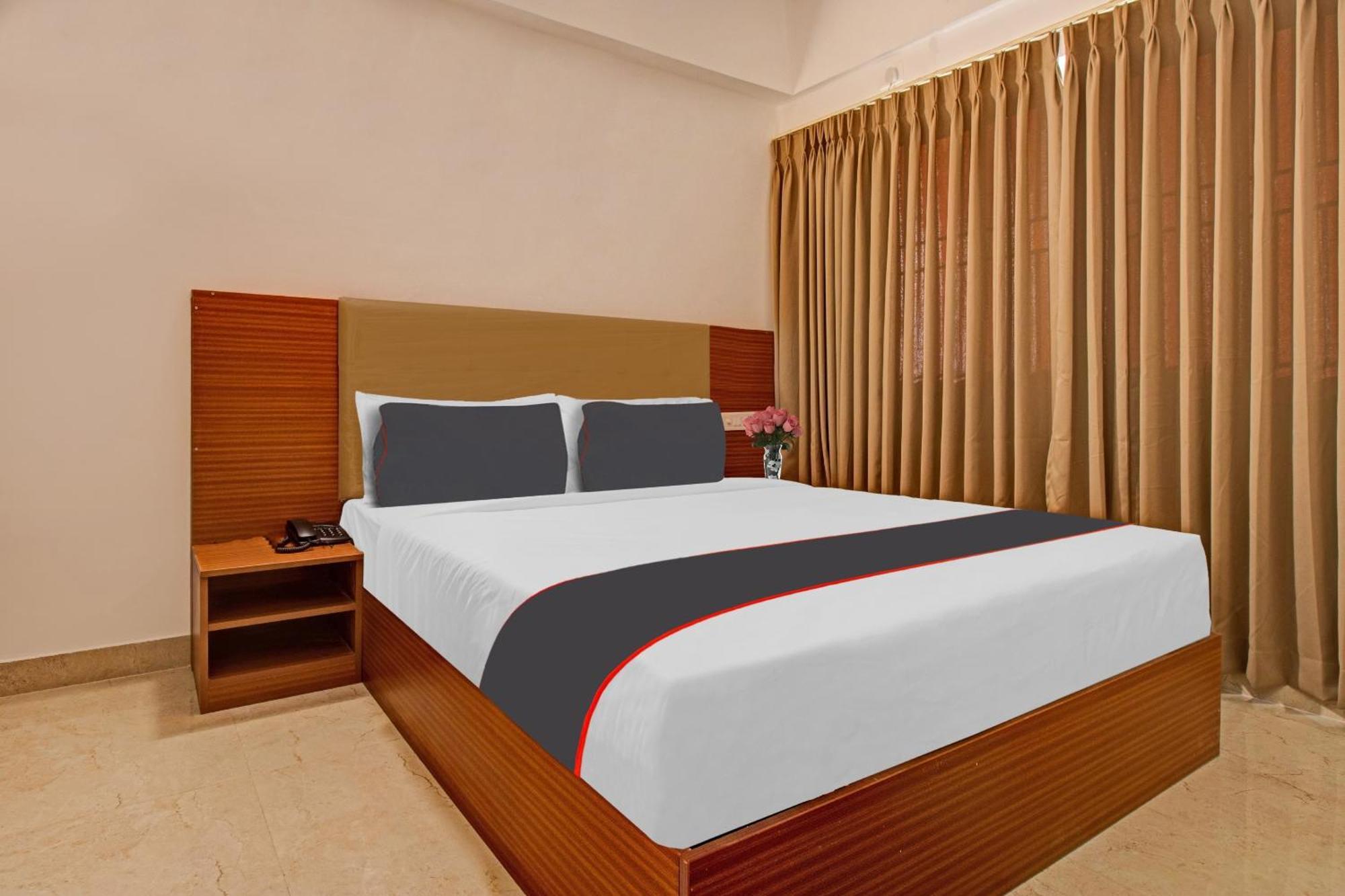 Hotel Super Collection O Petals Otium Business Bangalore