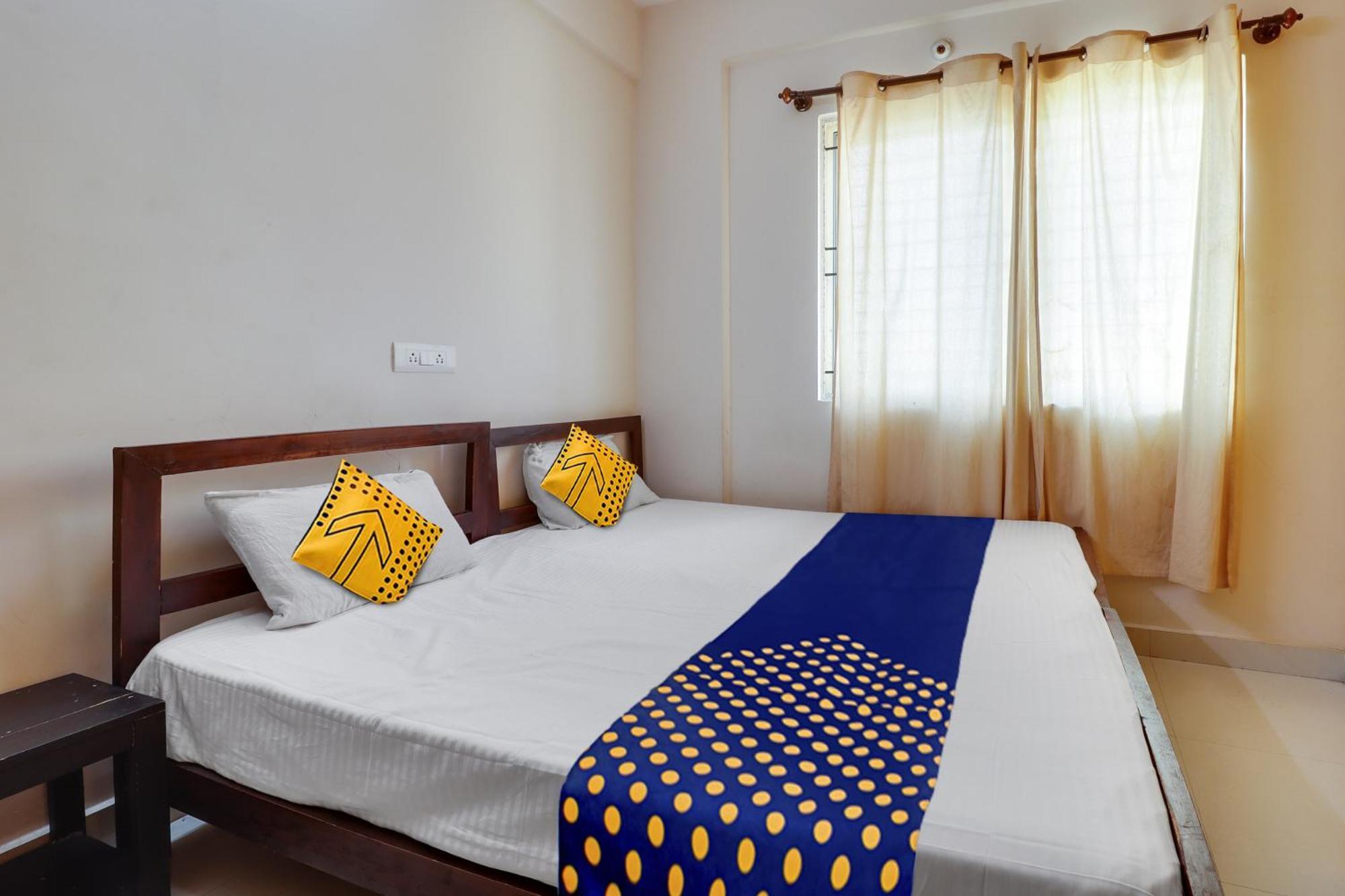 Hotel Spot On Helloworld Dom Bangalore
