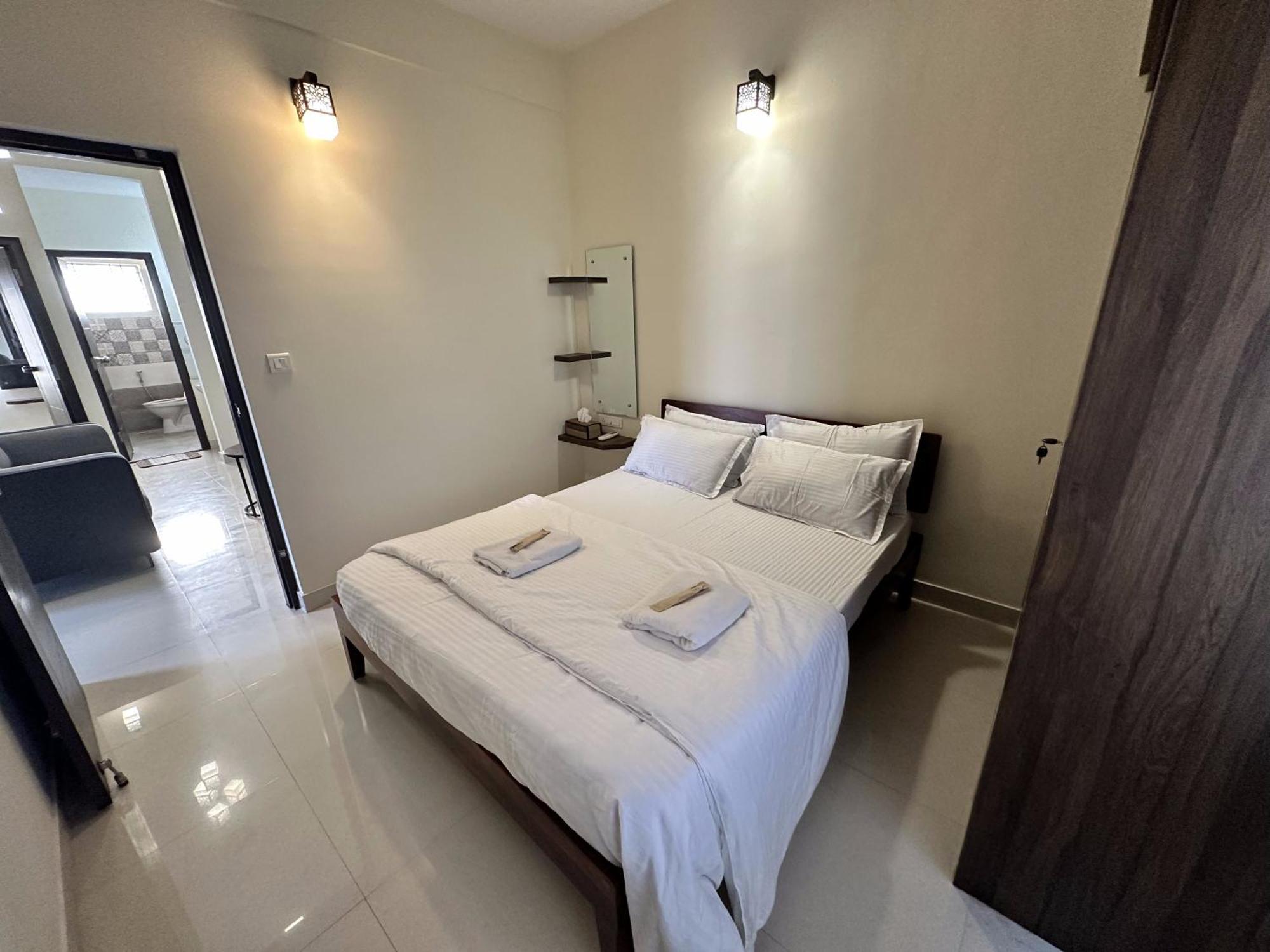 Trinetra Homes 61 Hotel Bangalore