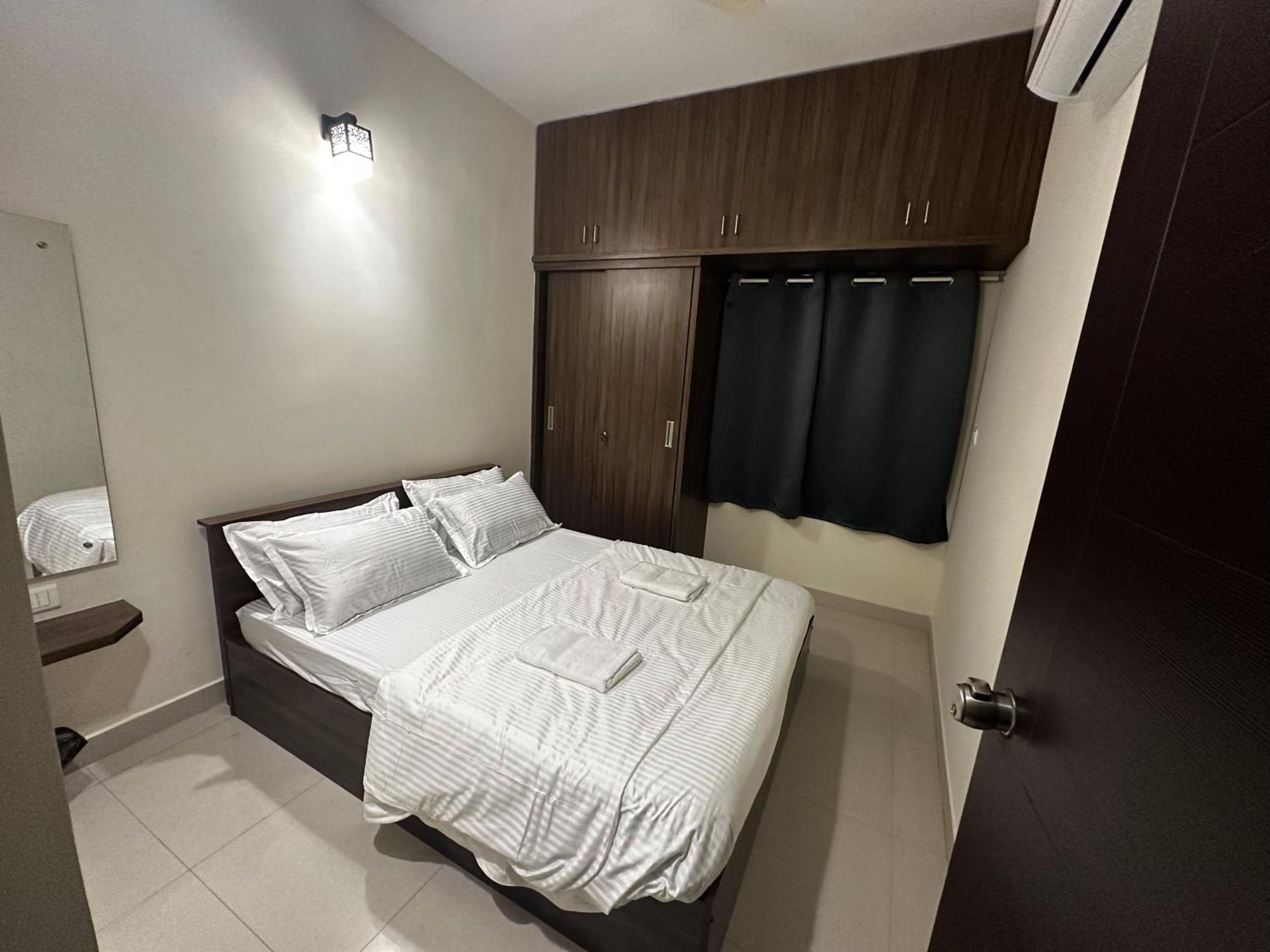 Trinetra Homes 61 Hotel