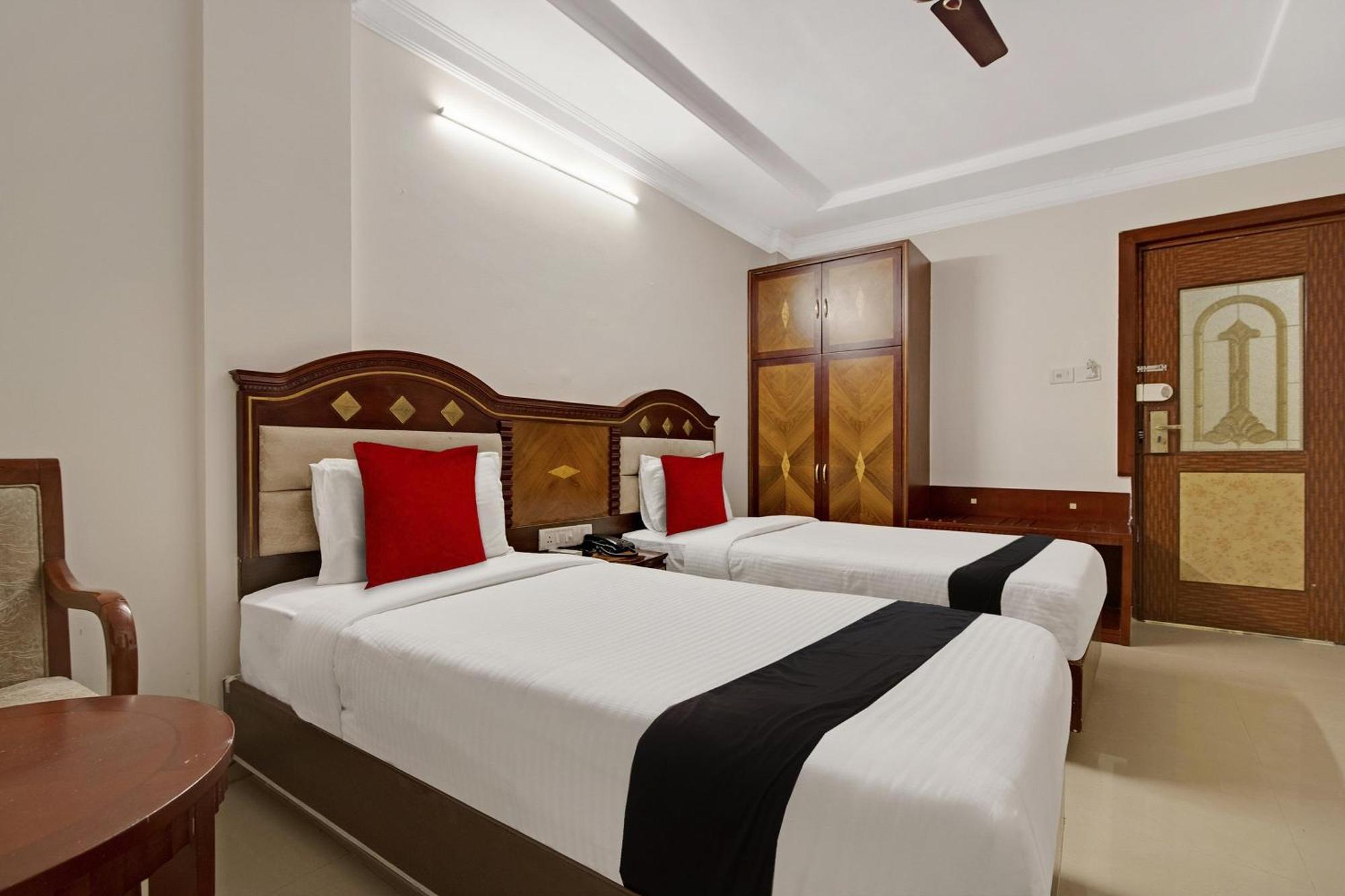 Hotel Capital O Elegant Amethyst Business Near Ragigudda Sri Prasanna Anjaneyaswamy Temple Bangalore