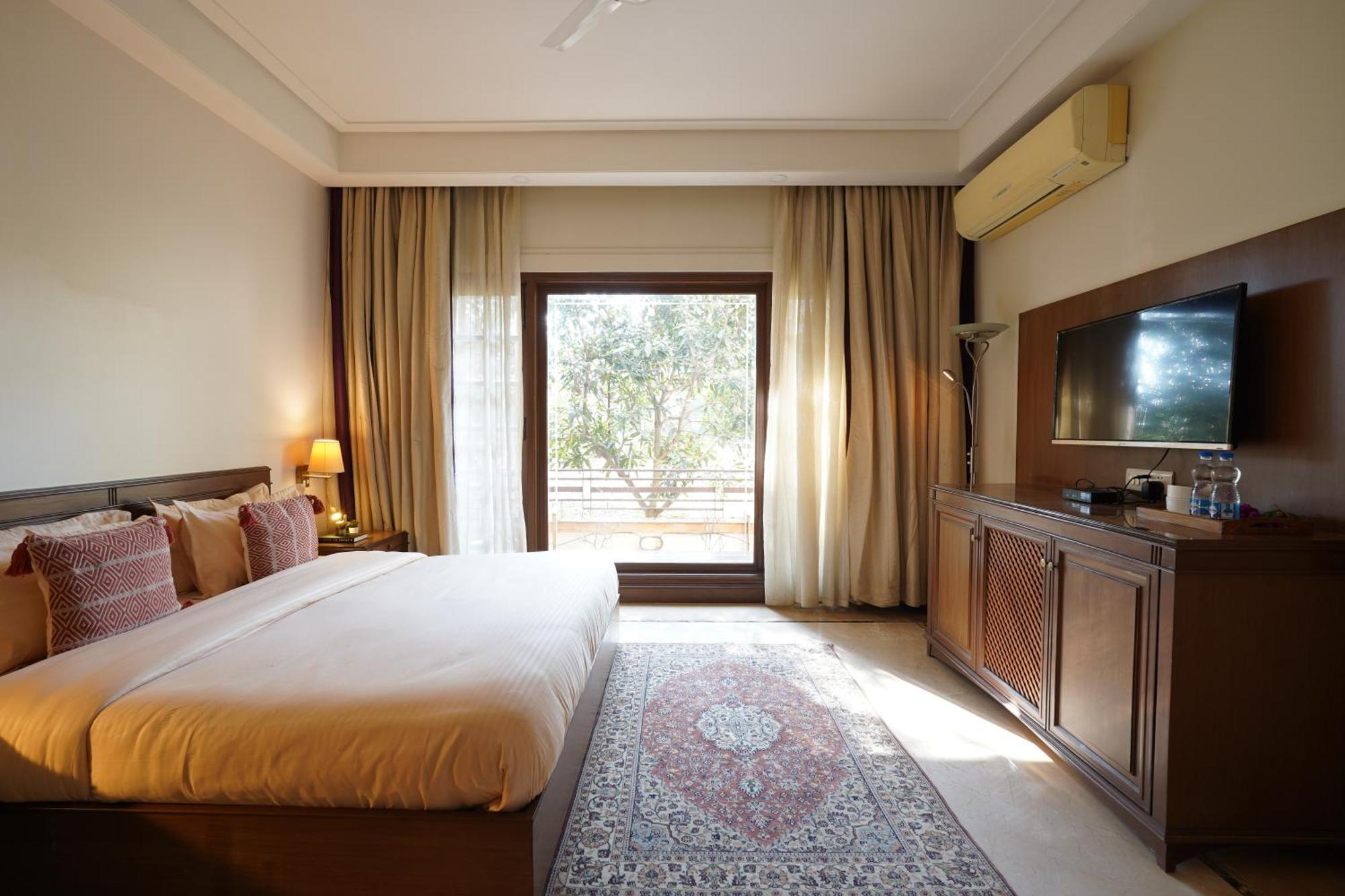 Sliceinn Gulmohar- Near Kempegowda International Airport, Bangalore