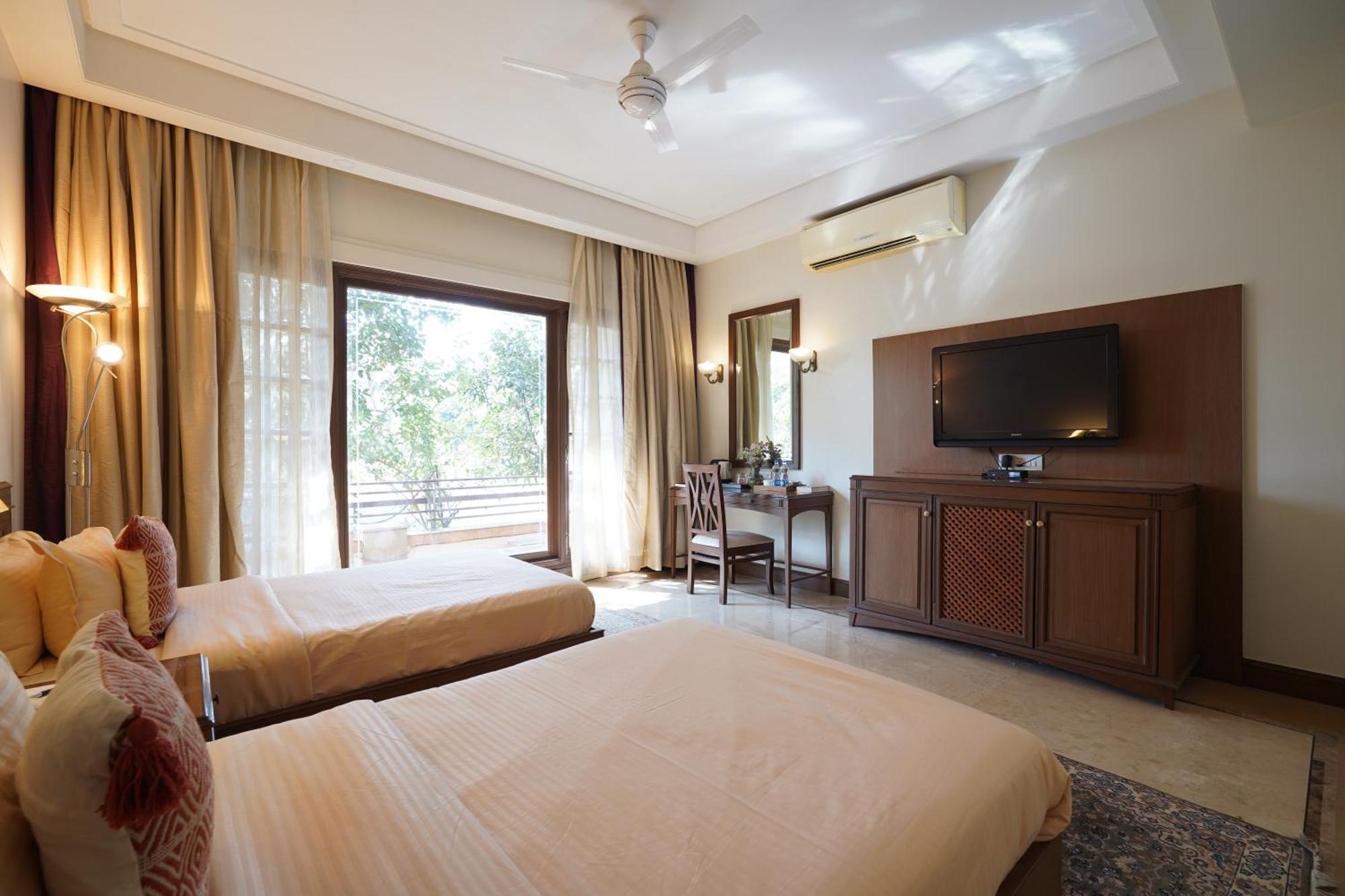 Sliceinn Gulmohar- Near Kempegowda International Airport,