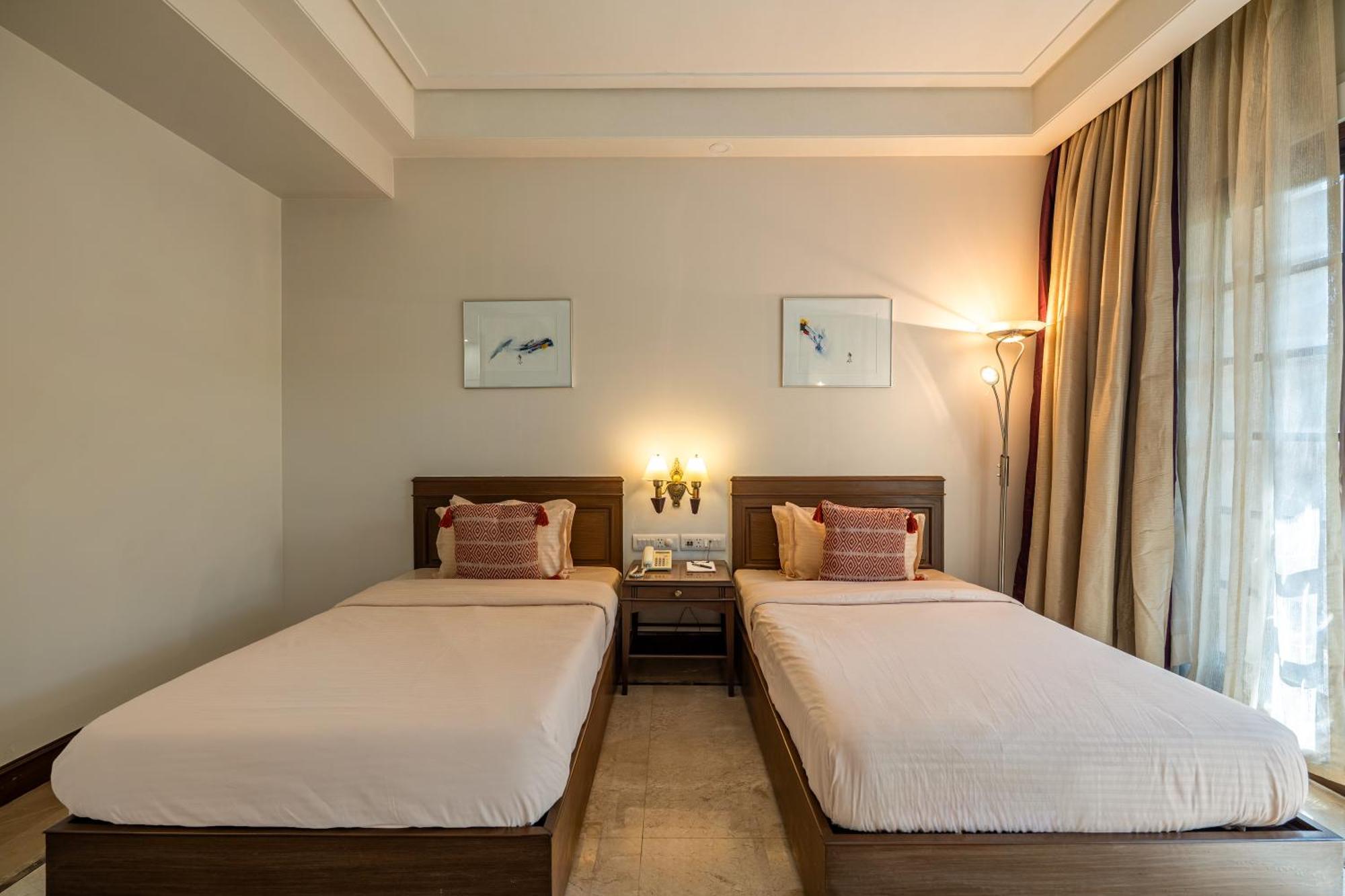 Sliceinn Gulmohar- Near Kempegowda International Airport,