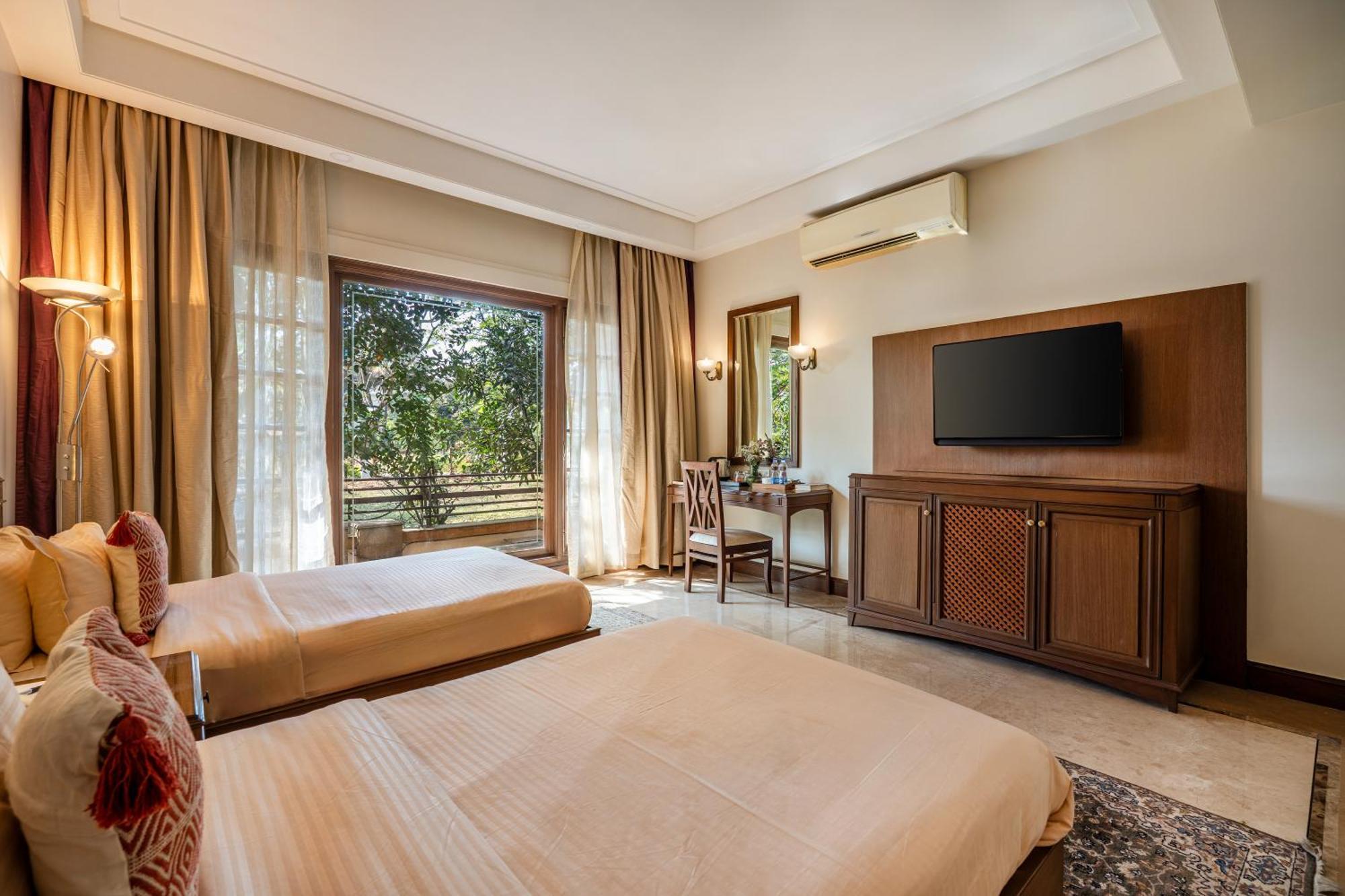 Sliceinn Gulmohar- Near Kempegowda International Airport,
