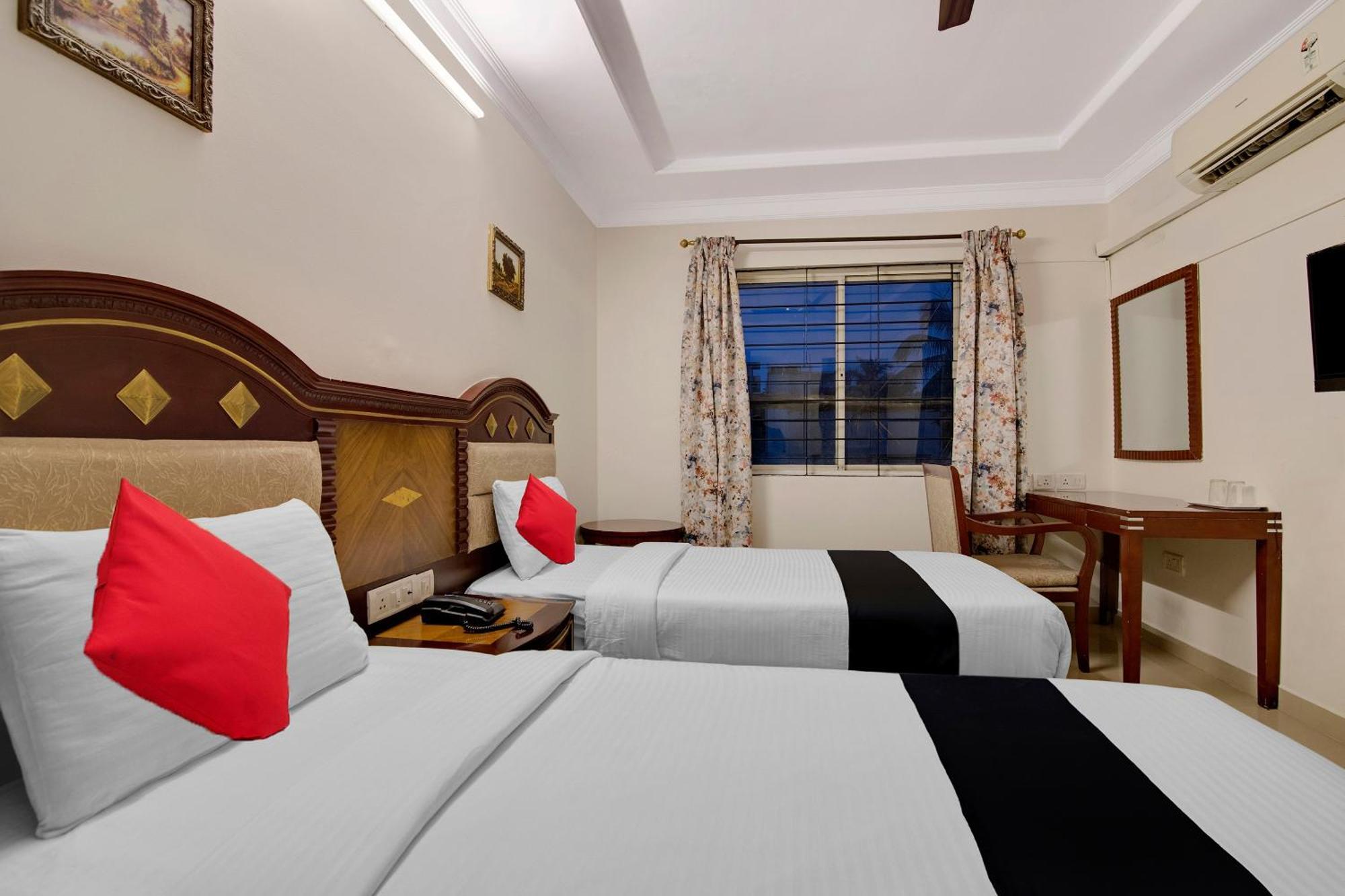 Capital O Elegant Amethyst Business Near Ragigudda Sri Prasanna Anjaneyaswamy Temple Hotel