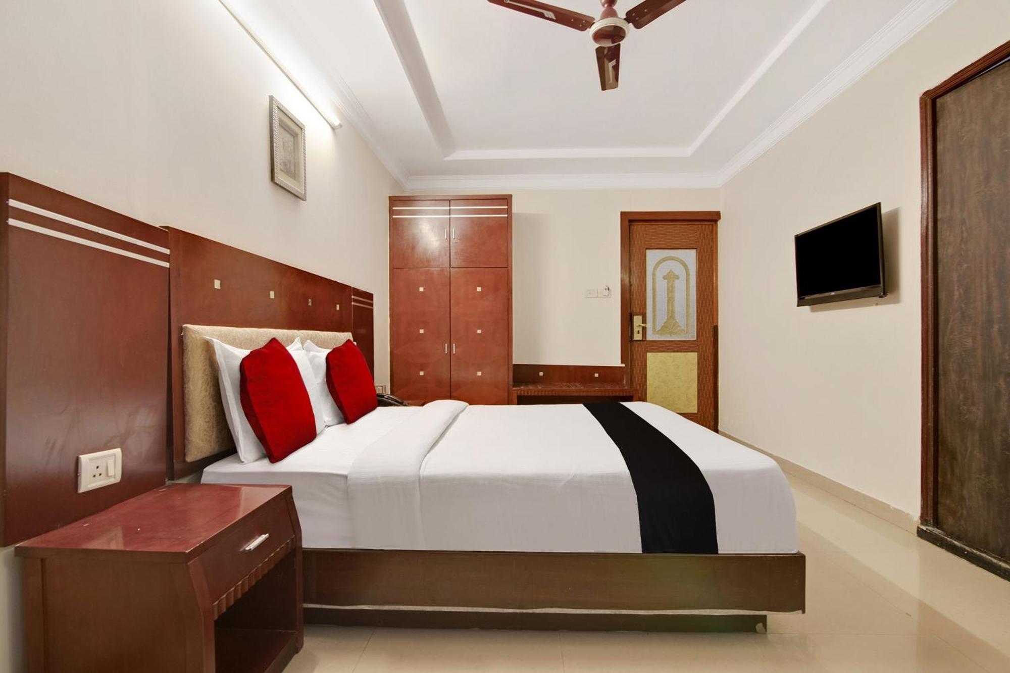 Hotel Capital O Elegant Amethyst Business Near Ragigudda Sri Prasanna Anjaneyaswamy Temple Bangalore