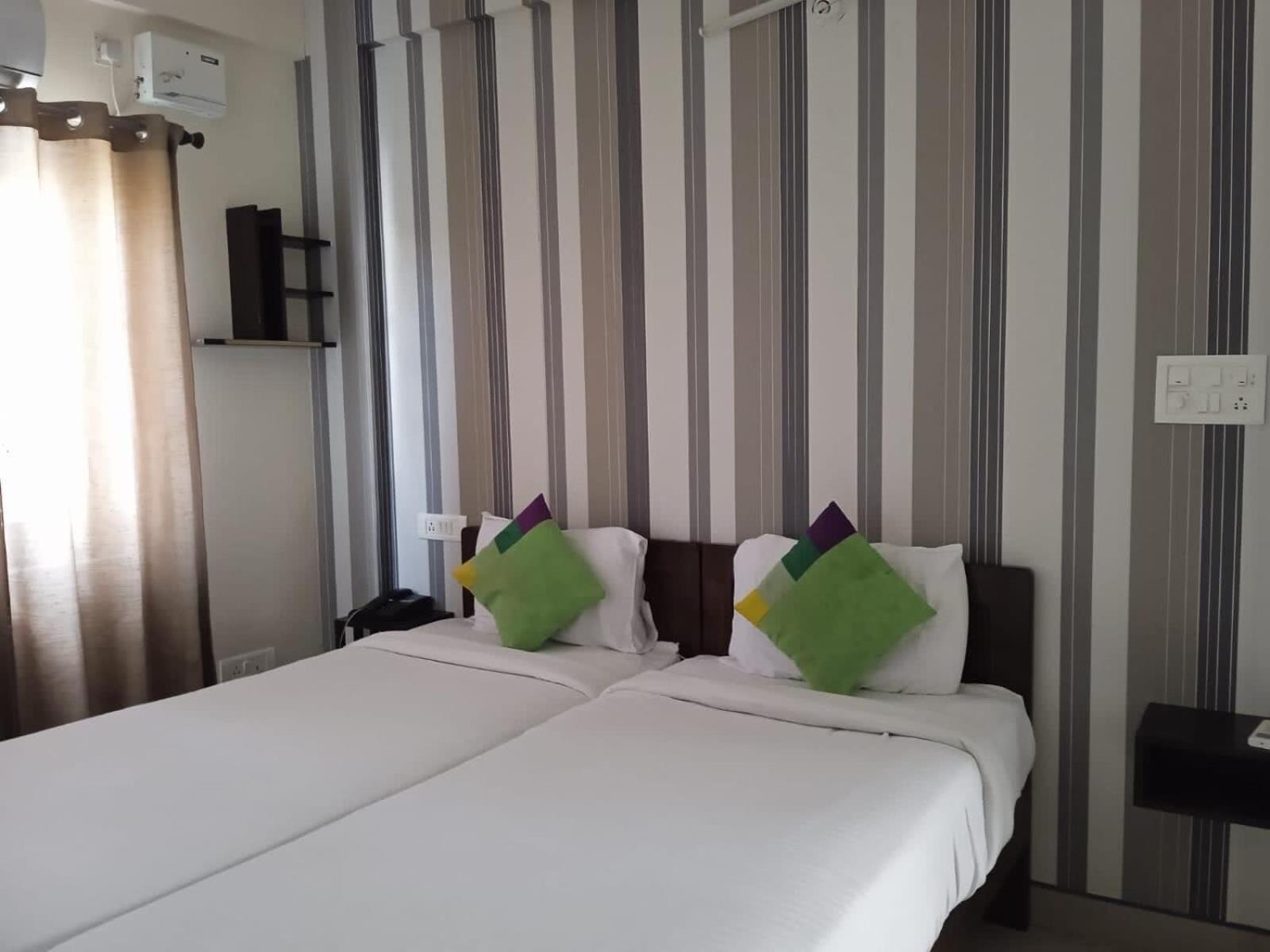 Hotel Collection O Green Wood 5 Bangalore