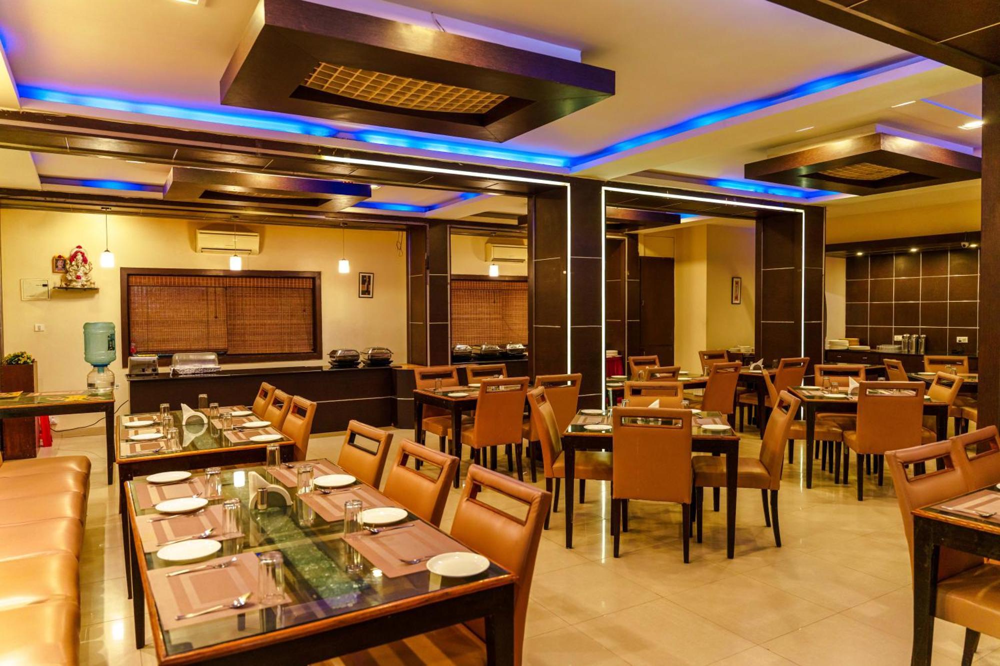 Bisque Magaji Orchid - Near Majestic Railway Station