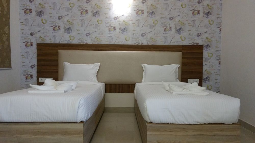 Fabexpress Hibiscus Suites Hebbal Hotel Bangalore