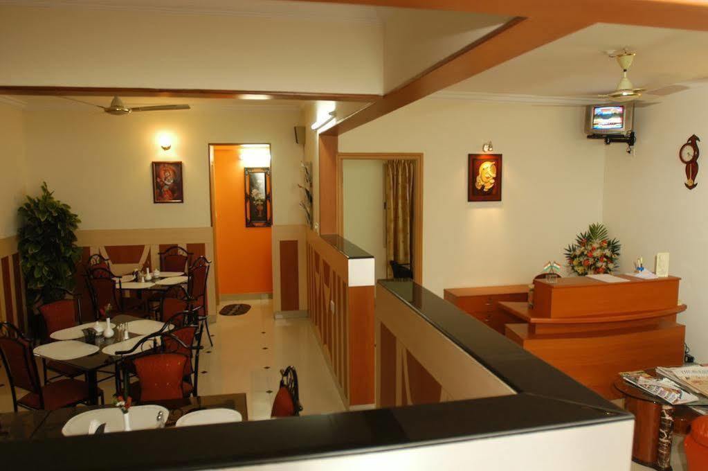 Hotel Raj Comforts -golf View Bangalore