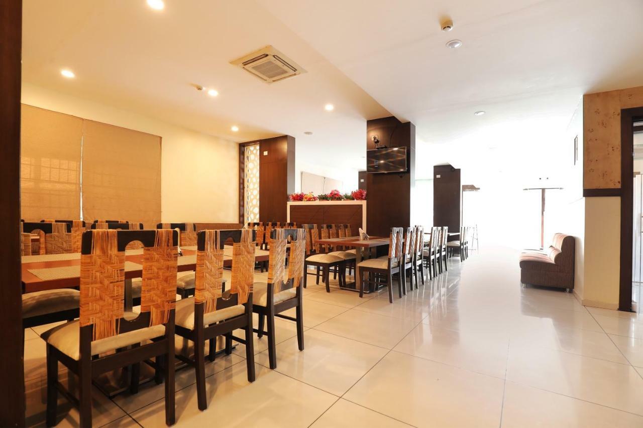 Capital O 28398 Mysore Gate Hotel Bangalore
