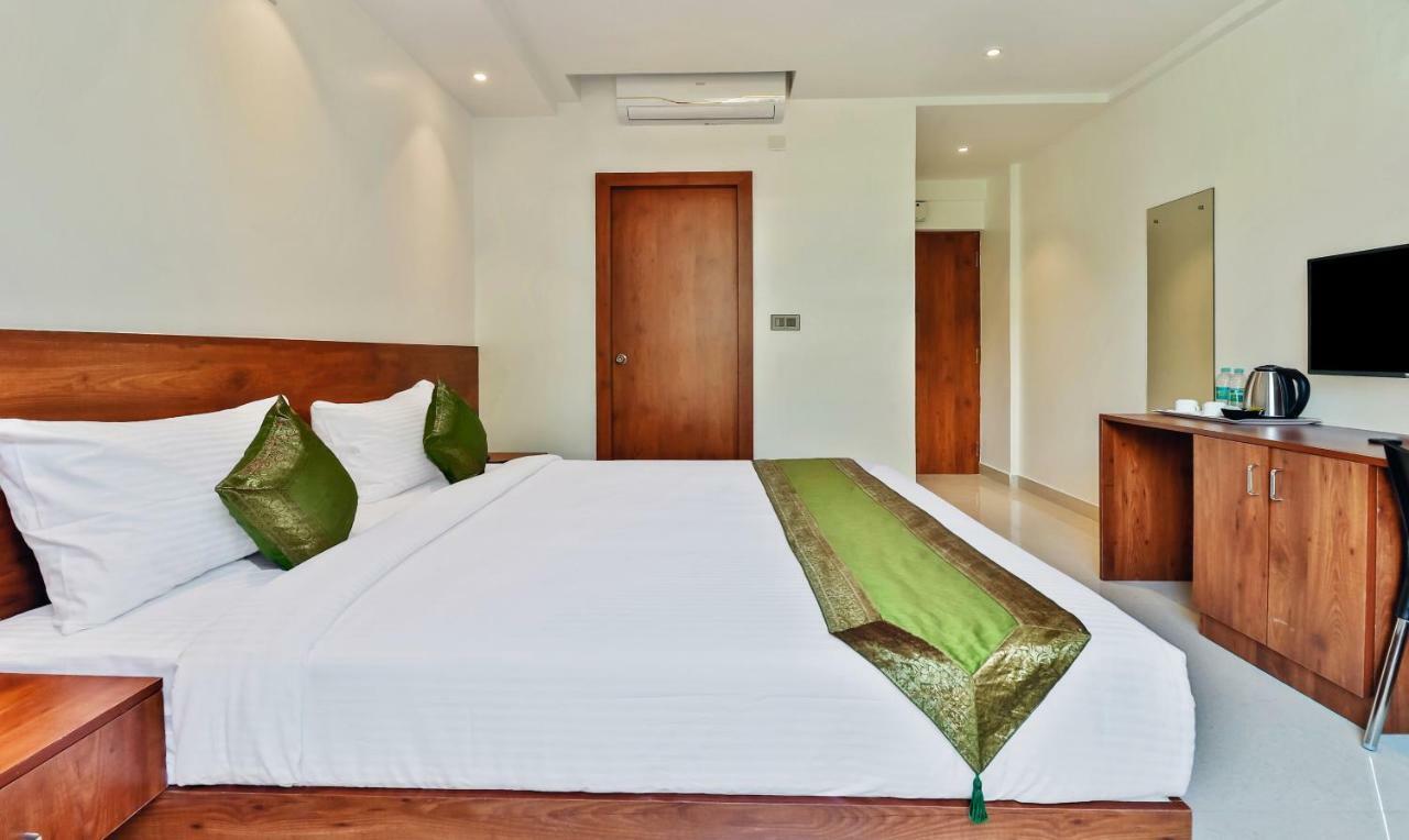 Treebo Blu Orchid Hotel Bangalore