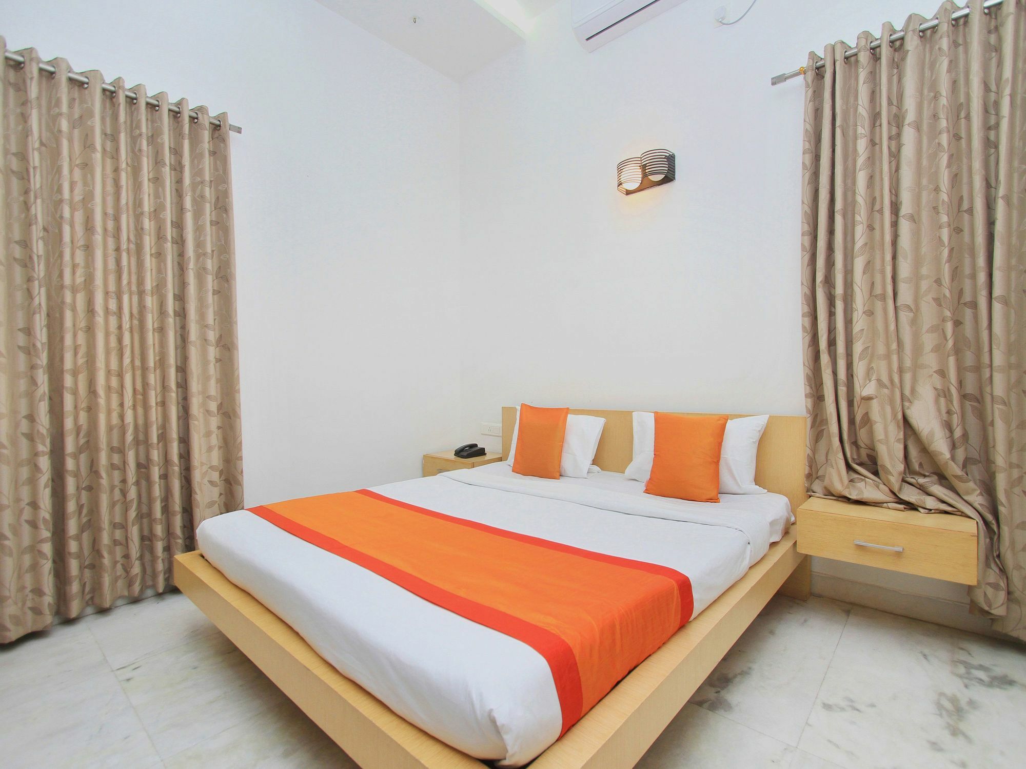 Capital O 11590 Red Carpet Hotel Bangalore