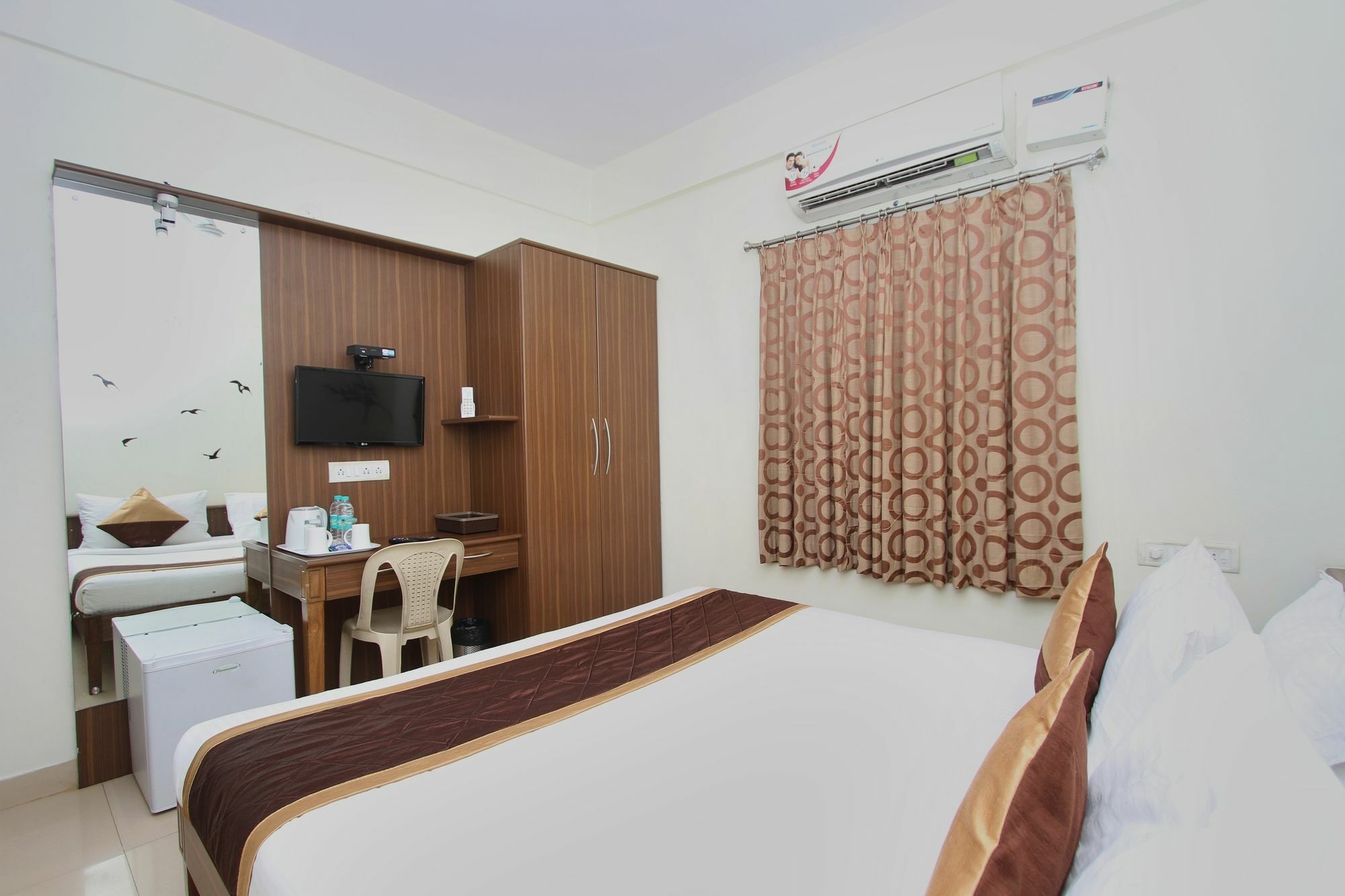 Oyo 7669 The Trinitywood Hotel Bangalore