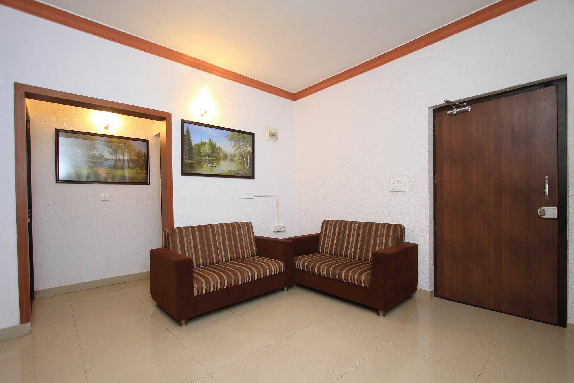 Hotel Collection O Pride Homes Bangalore