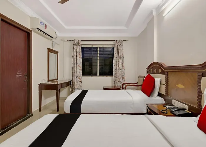 Capital O Elegant Amethyst Business Hotel Near Ragigudda Sri Prasanna Anjaneyaswamy Temple