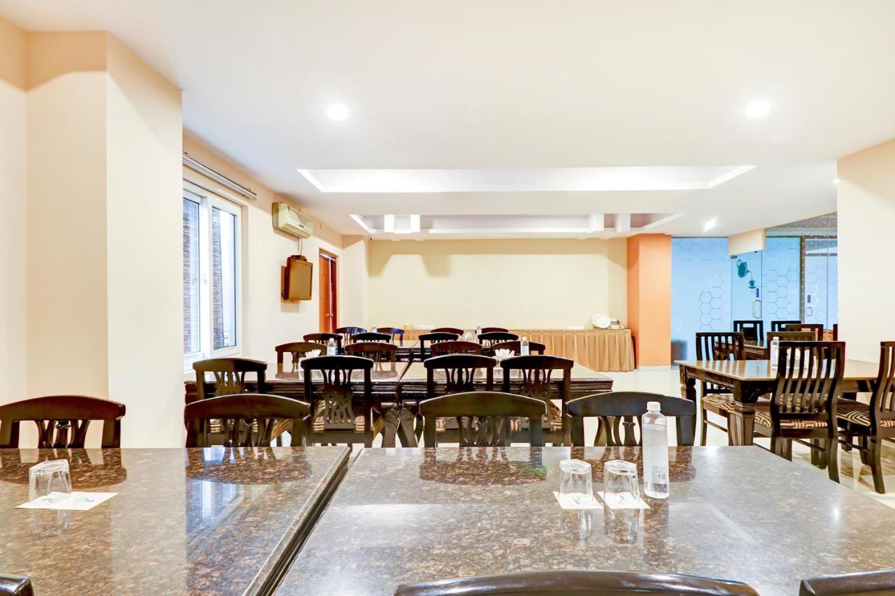 Hotel Capital O 46966 Apollo 27 Bangalore
