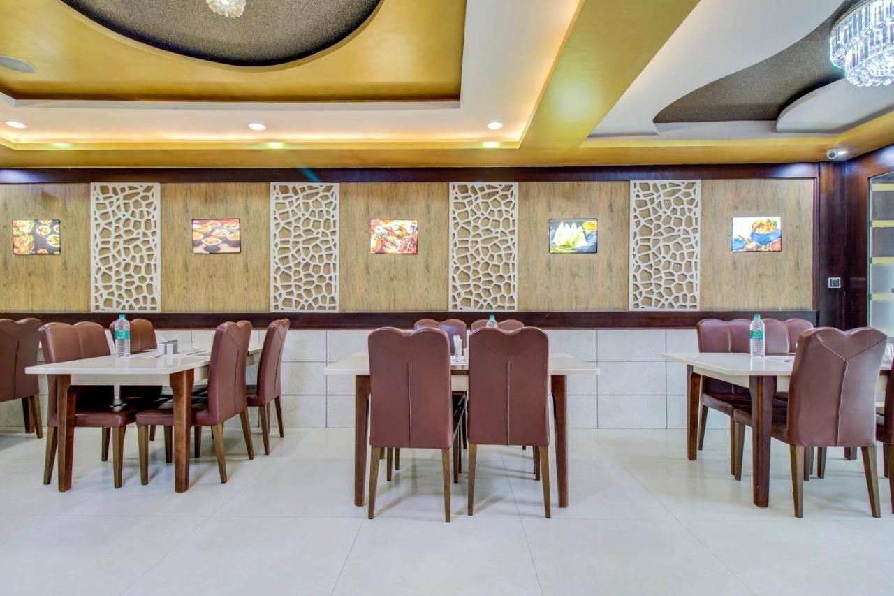 Hotel Capital O 5381 The Emirates Bangalore
