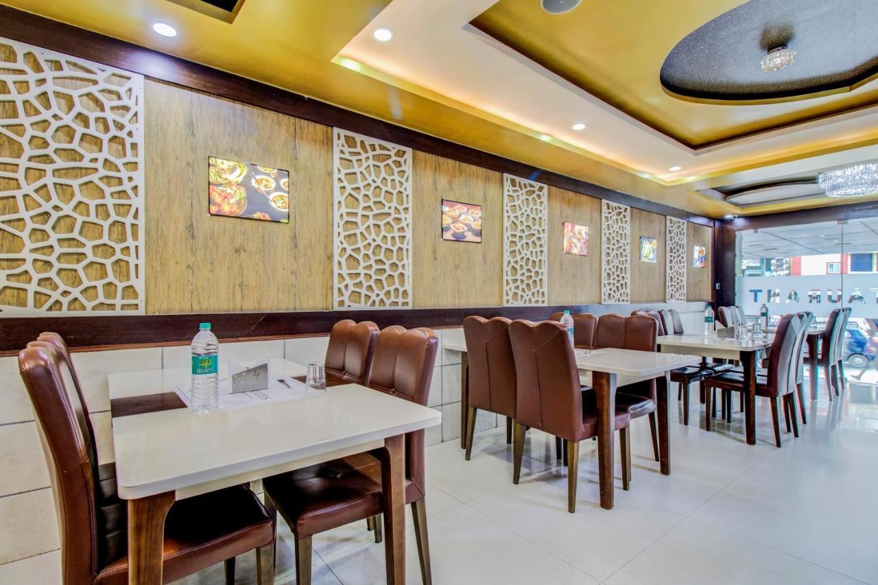 Hotel Capital O 5381 The Emirates Bangalore
