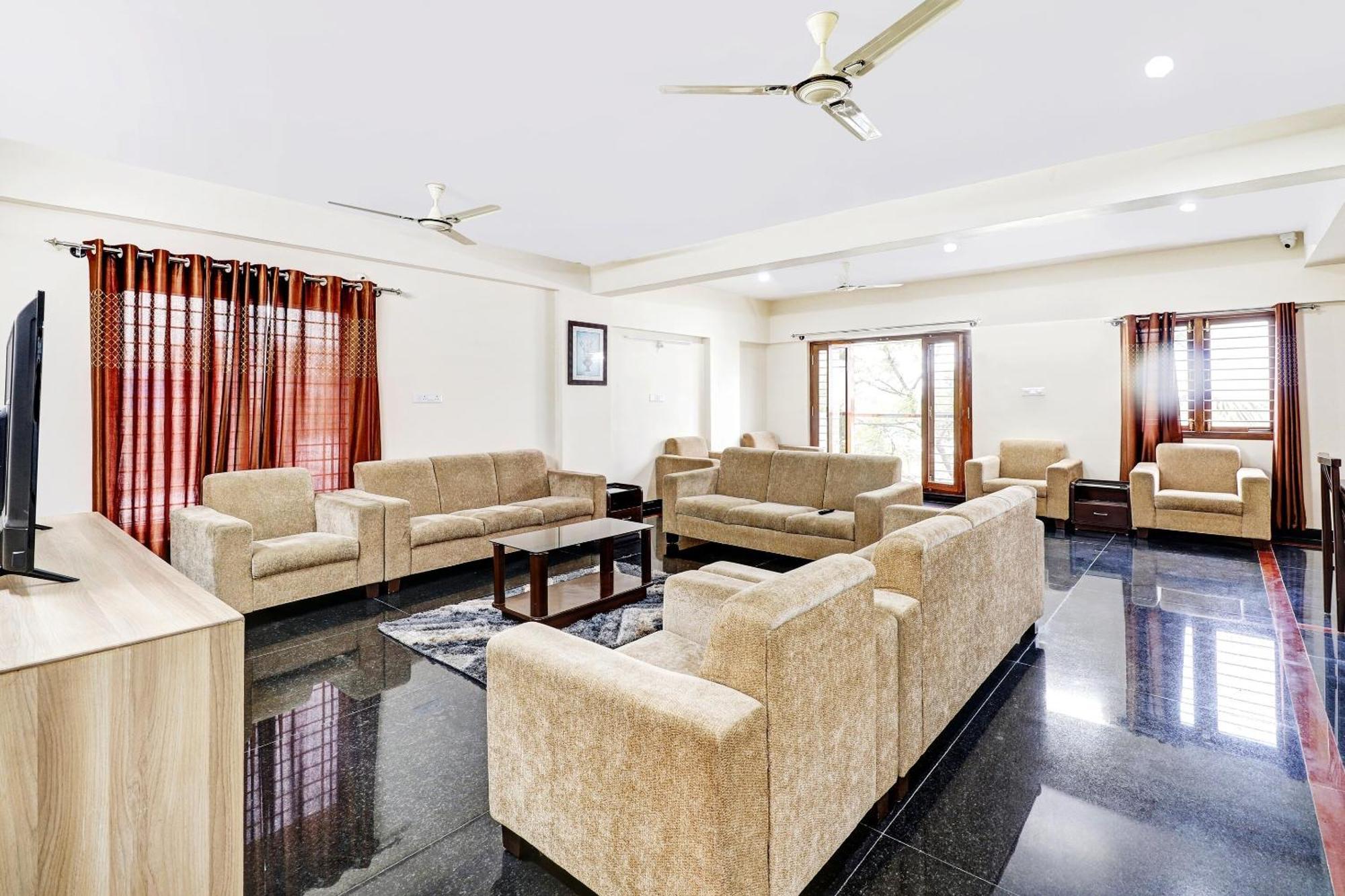 Capital O R R Residency Hotel