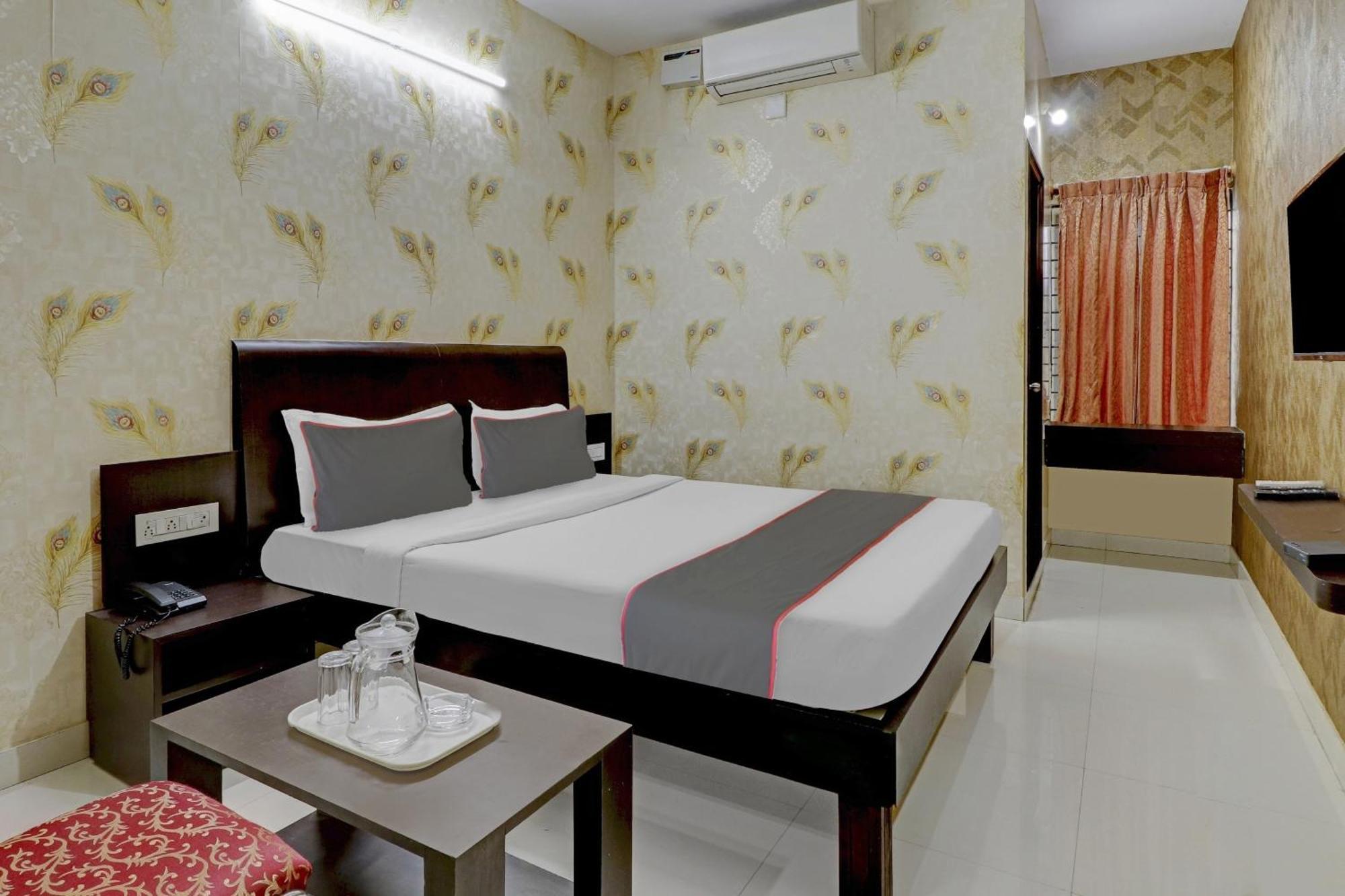 Hotel Capital O Champion Lotus Near Mantri Square Mall Bangalore