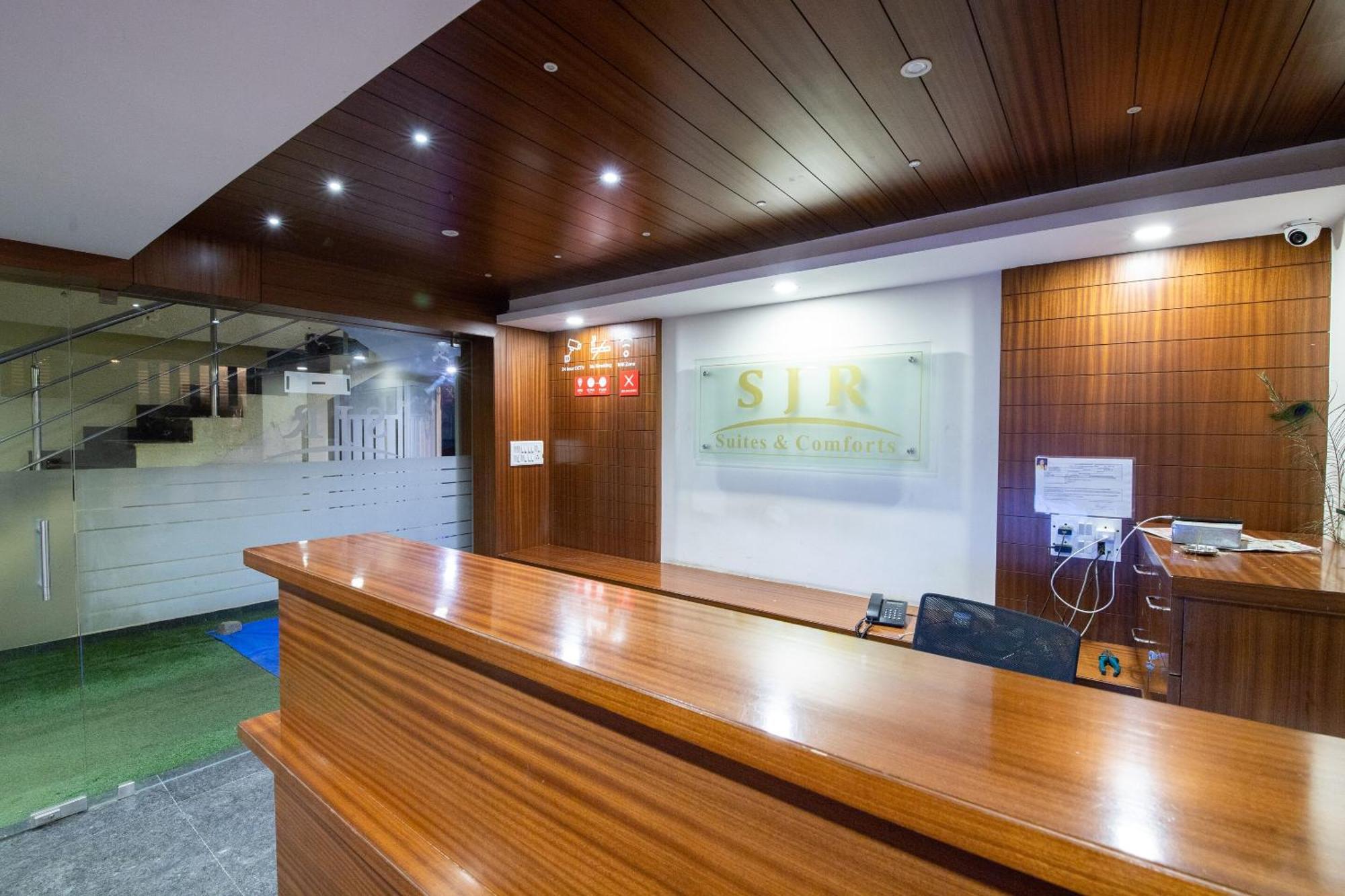 Capital O 9917 Sjr And Comforts Hotel Bangalore
