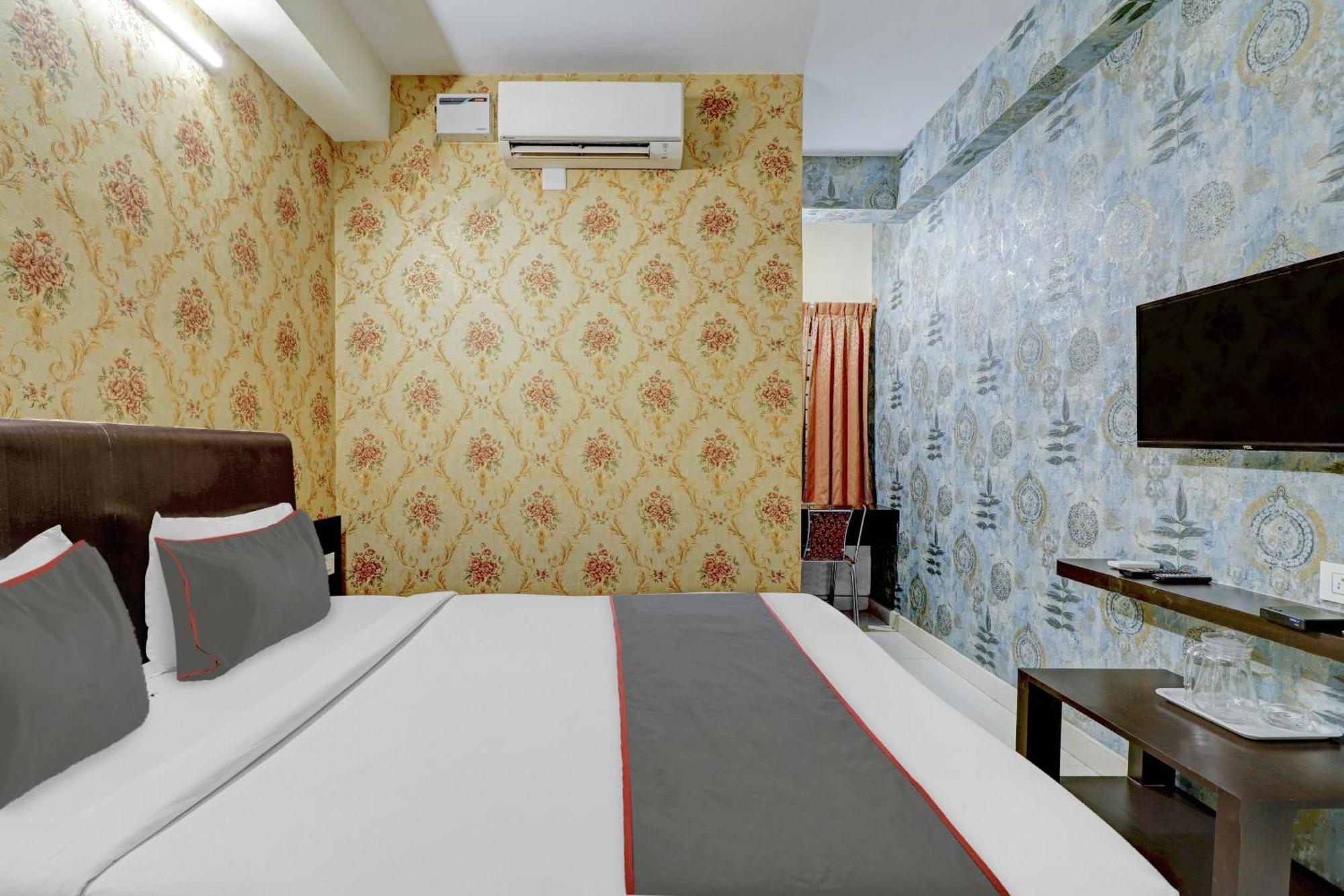 Hotel Capital O Champion Lotus Near Mantri Square Mall Bangalore